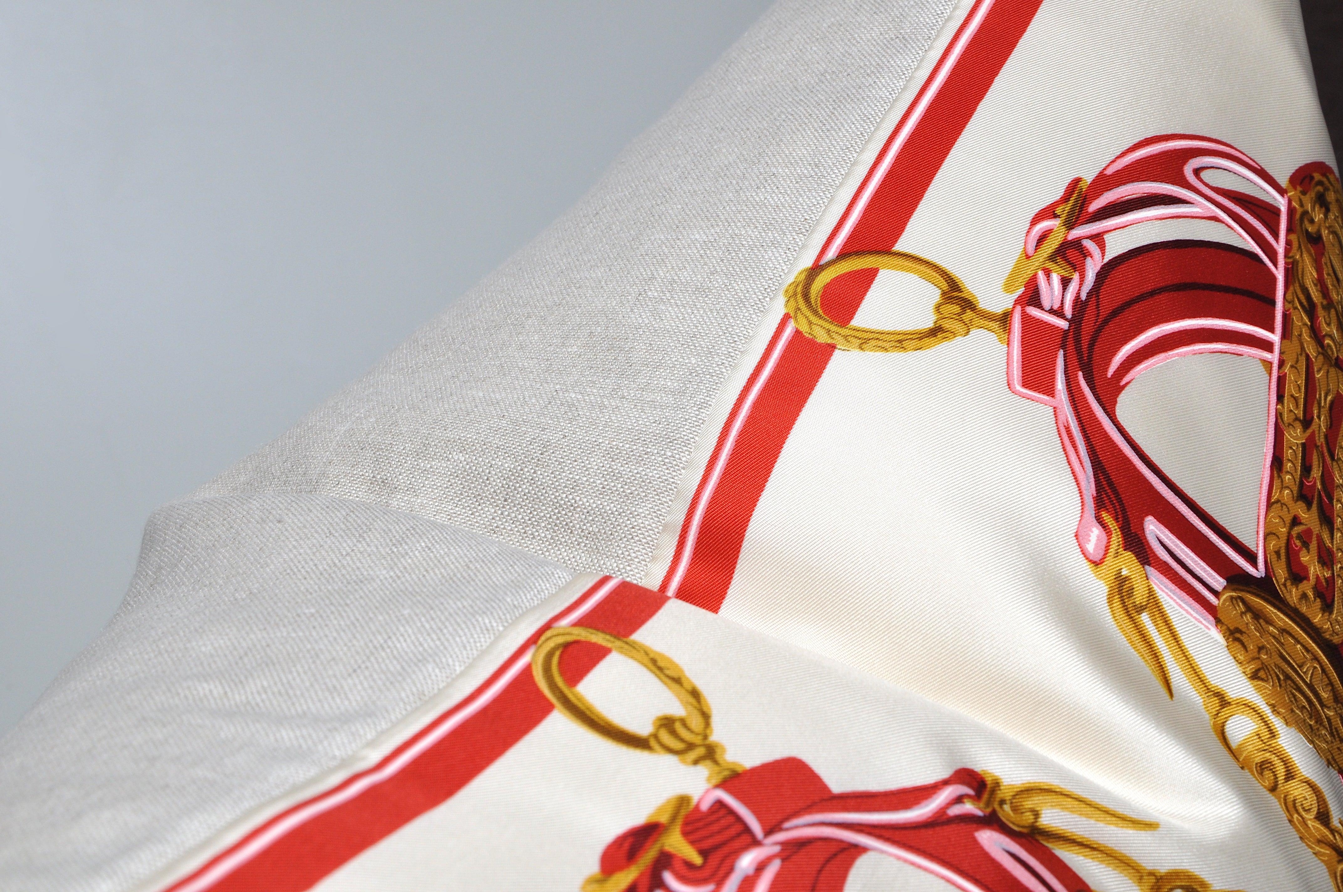The ‘crème de la crème’ of scarves, this beauty is a one-of-a-kind custom made cushion (pillow) created from an exquisite vintage silk Hermes fashion scarf in a striking equestrian design. The French company began in 1837 producing superior quality