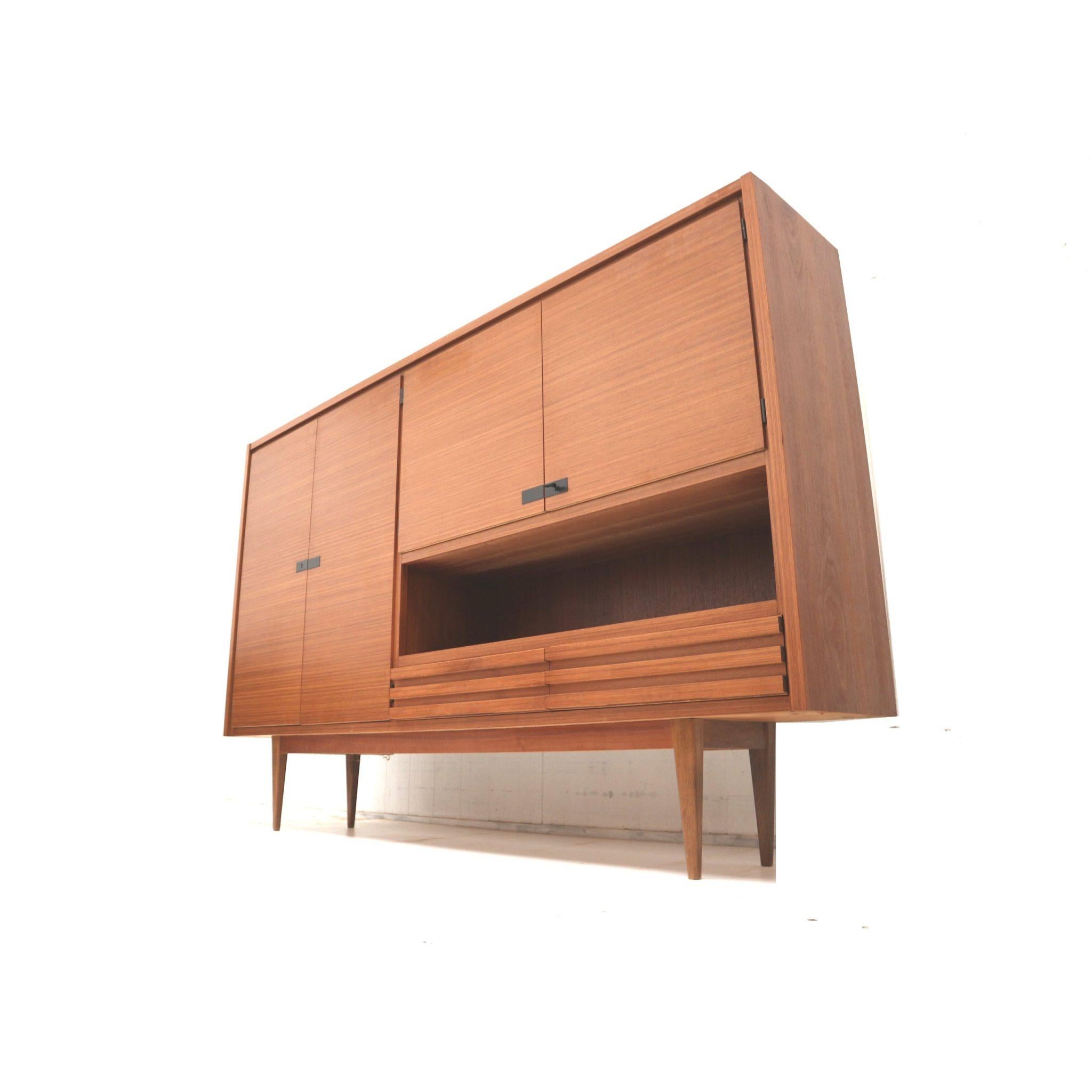 European Large vintage highboard sideboard / wall unit made of teak from the 1960s For Sale