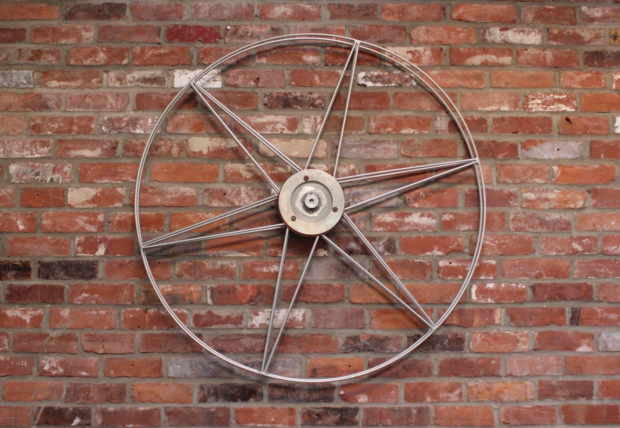 Pellicola d'epoca le cui bobine formano una stella (anni '40 circa, USA).
Impressionante pezzo di arredamento hollywoodiano di dimensioni uniche (42