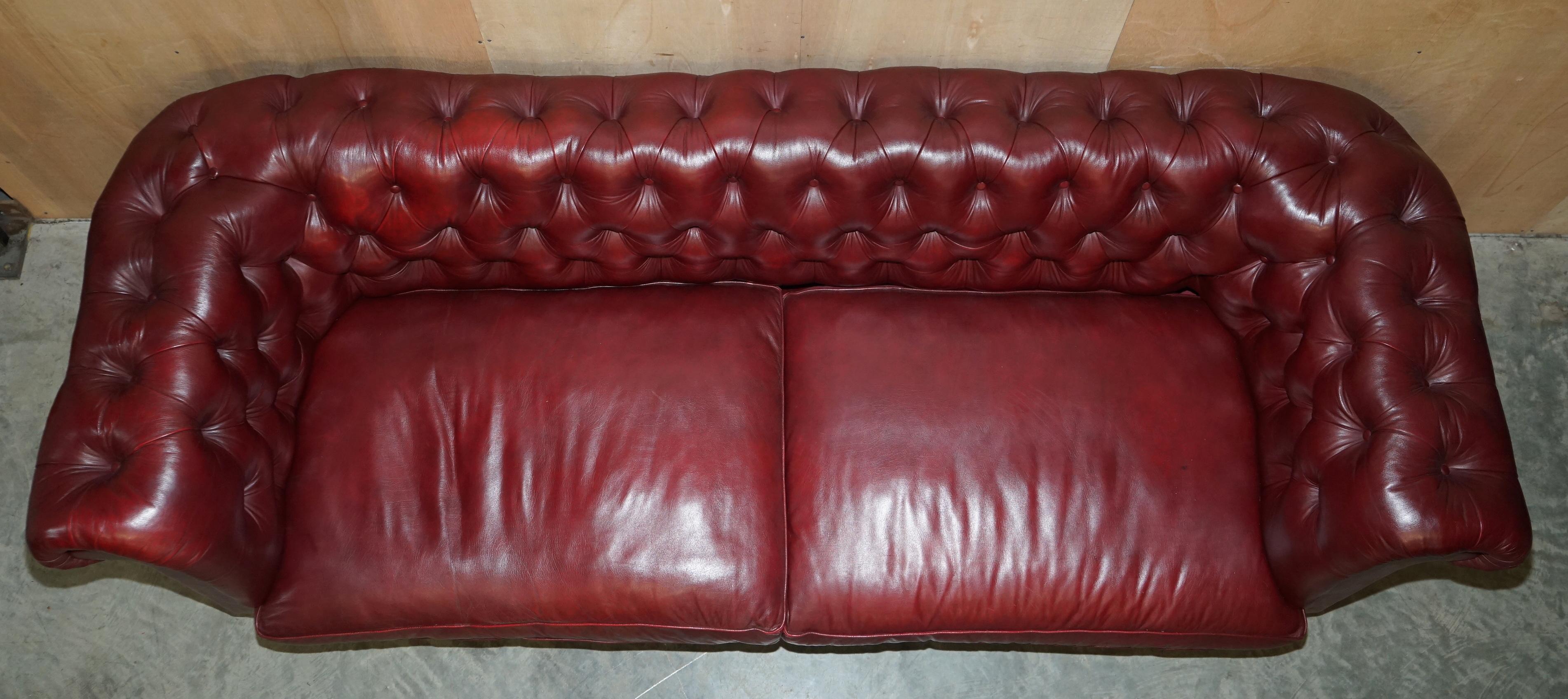 Large Vintage Howard & Son's Oxblood Leather Fully Stamped Chesterfield Sofa For Sale 11