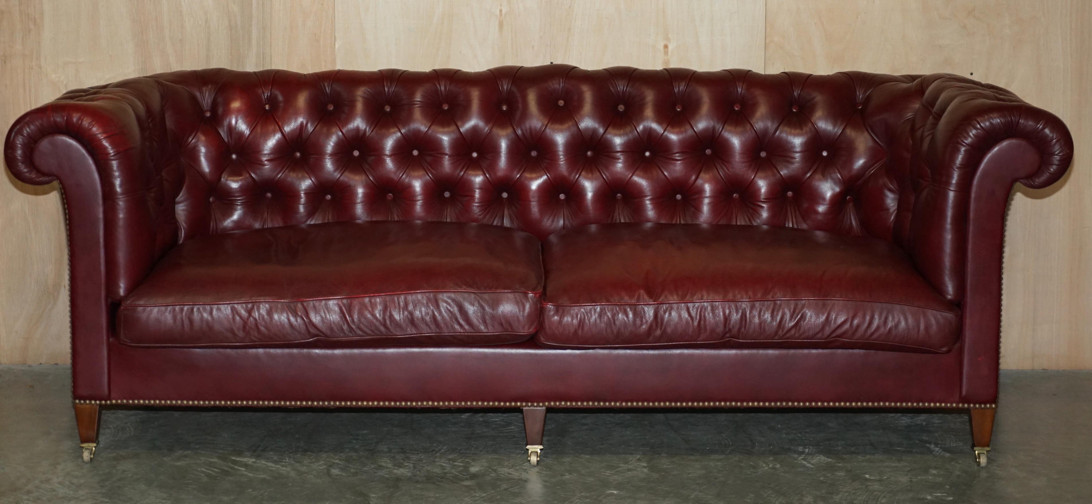 English Large Vintage Howard & Son's Oxblood Leather Fully Stamped Chesterfield Sofa For Sale