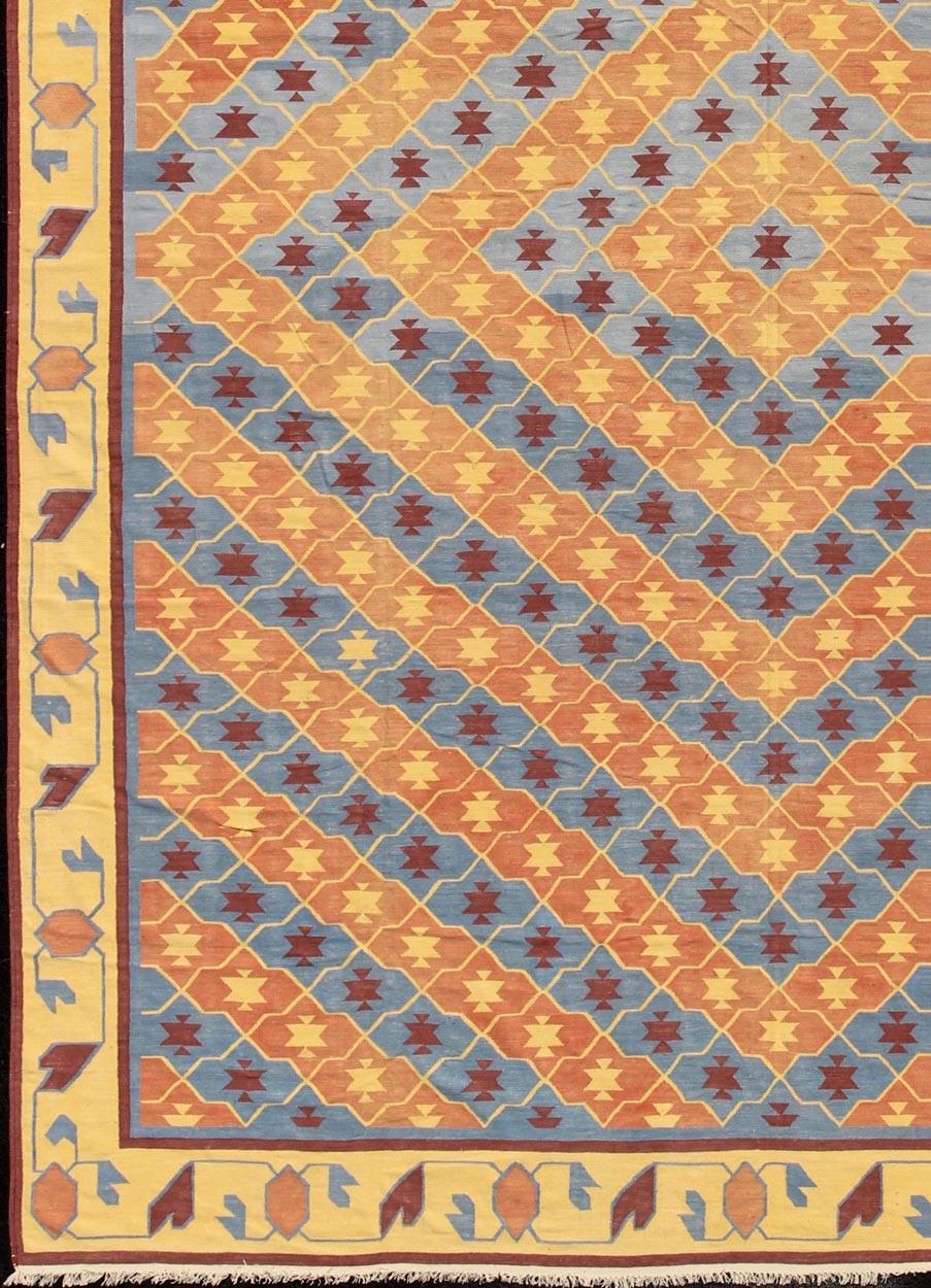 Colorful vintage Indian Dhurrie with Geometric design, rug 19-0301, country of origin / type: India / Dhurrie, circa 1960.

Woven during the second half of the 20th century, this designer flat-woven Indian cotton dhurrie is decorated with a