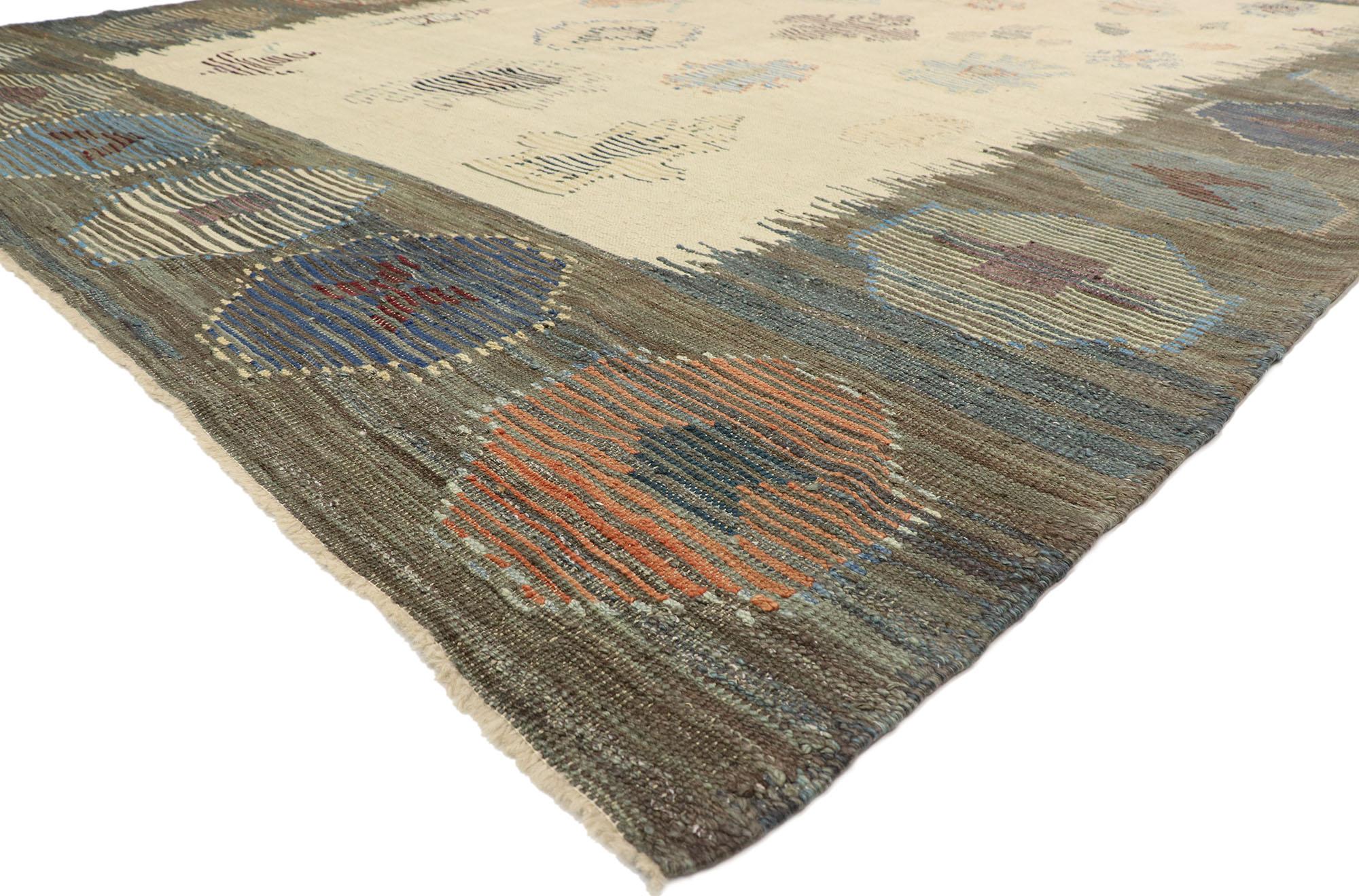 52214 Vintage-Inspired Turkish Kilim Rug, 10'02 x 14'02.
Wabi-Sabi meets rustic boho in this handwoven vintage-inspired Turkish kilim rug. The distinctive tribal elements and warm earthy colors woven into this piece work together creating a cultured