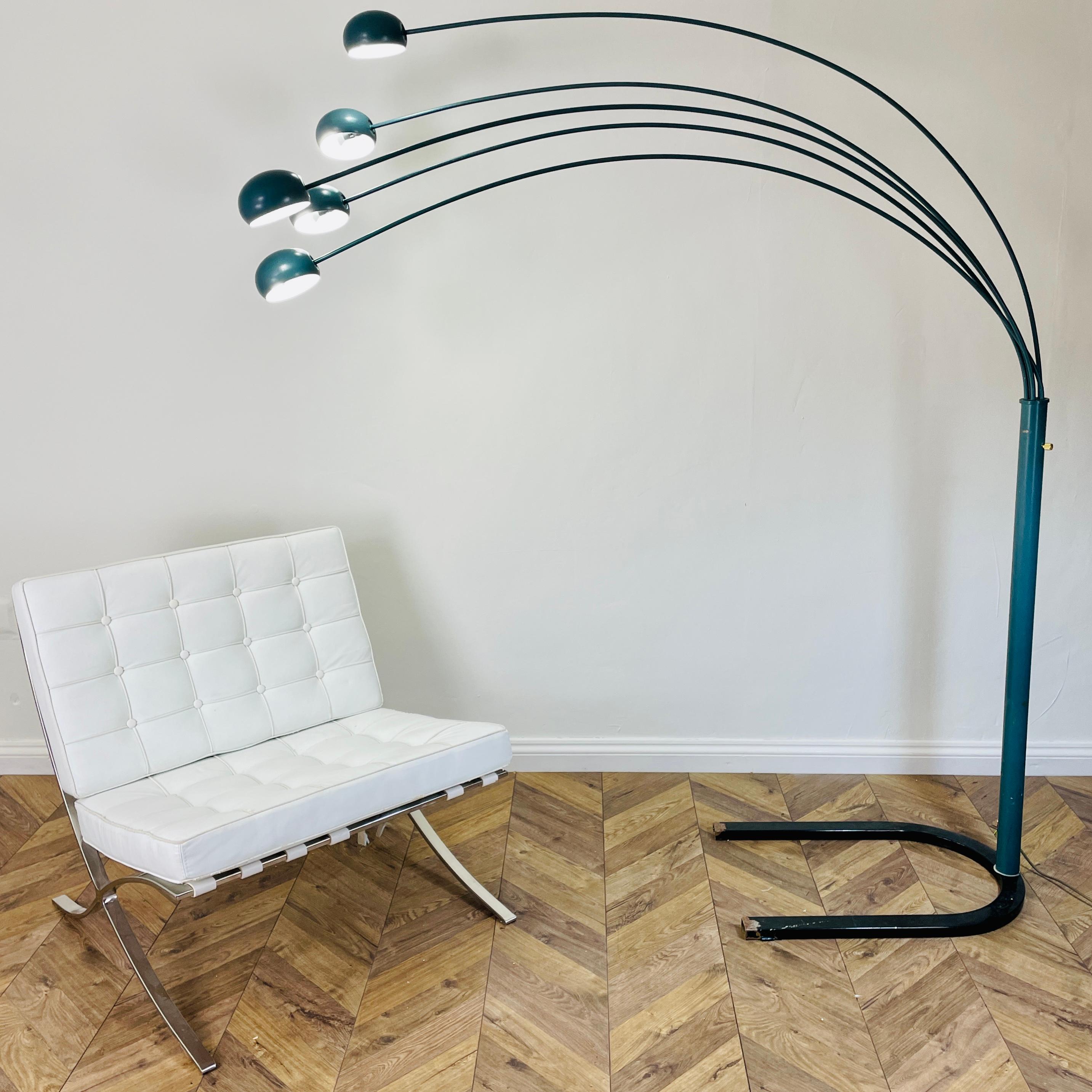 Super Mid Century, Large Floor Lamp, Attributed to Harvey Guzzini. c1970s.

The vintage Italian floor lamp features a black steel base (possibly changed from the original marble base) with 5 arc-shaped metal rods with dome shades, all teal