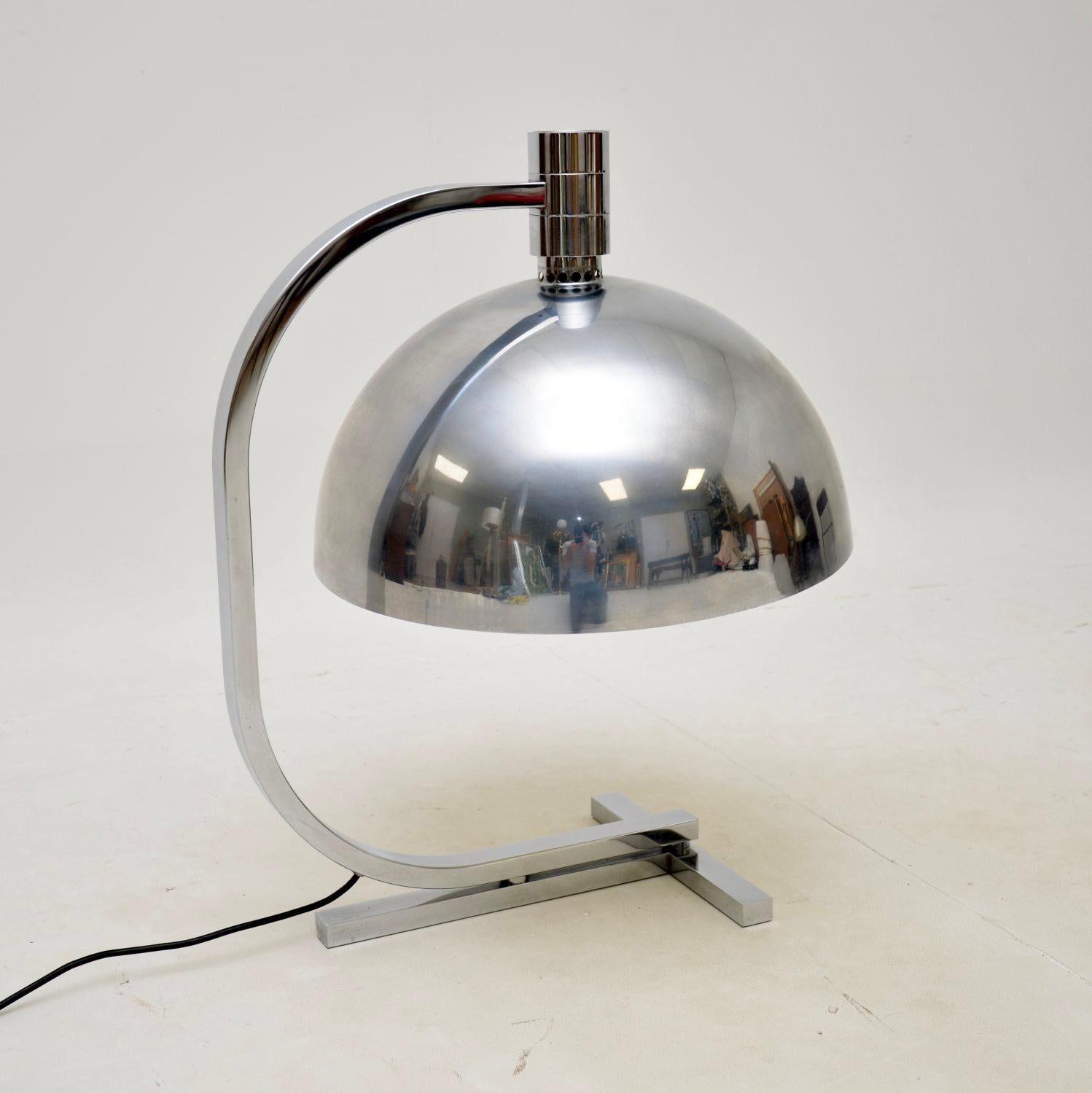A stunning and very large vintage Italian chrome table lamp by Franco Albini and Franca Helg. This was manufactured in Italy by Sirrah, it dates from the 1970’s.

This is the very rare large model with a huge chrome shade, they are more commonly