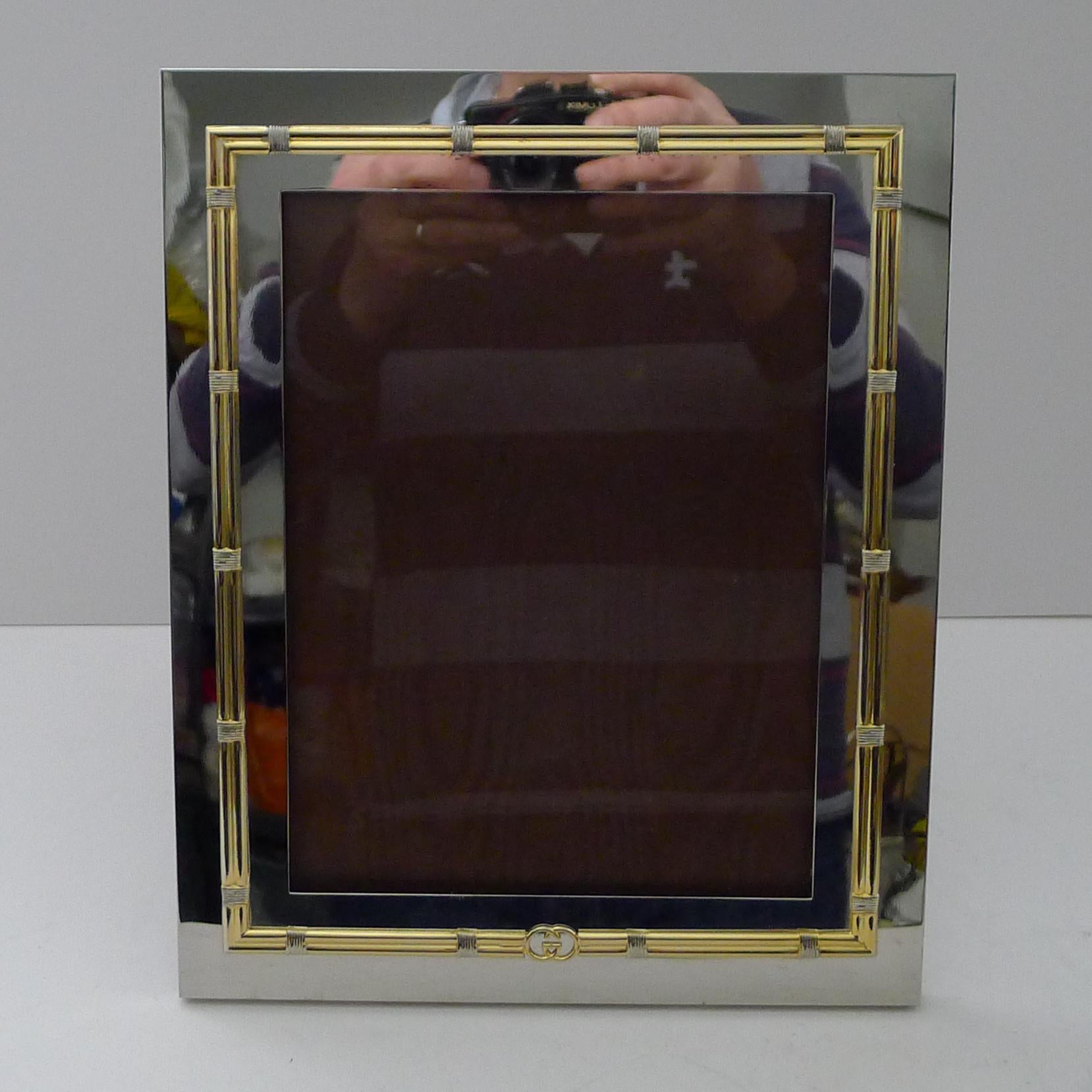 A magnificent sized vintage photograph or picture frame by the famous fashion house, Gucci.

Made from silver plate and lavishly finished with gold or gilding, the raised decoration incorporates the highly coveted GG logo.  The frame is also signed