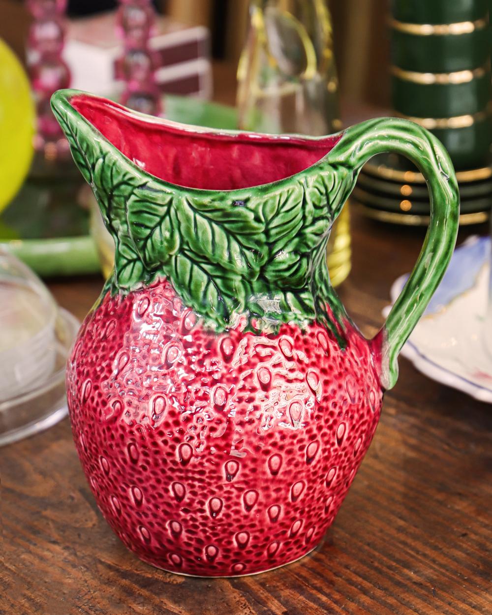 Introducing a charming and highly decorative large vintage Italian pitcher or jug shaped like a strawberry. It's a vibrant addition to your kitchen or table!

The pitcher is in good vintage condition, showing some expected wear for its age, but no