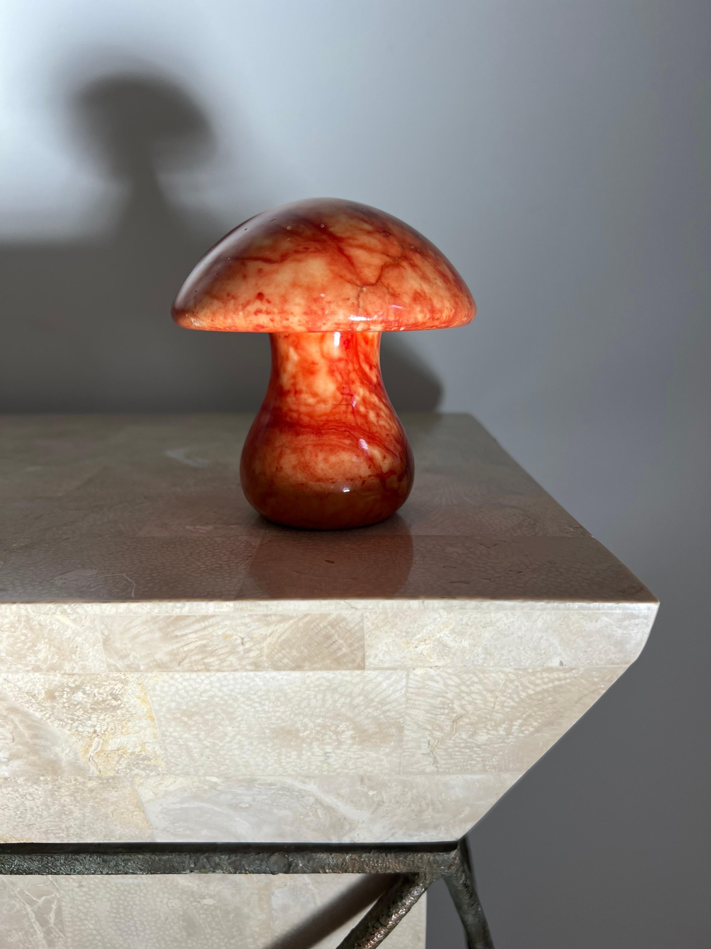 A uniquely large vintage Italian marble mushroom paperweight or objet d’art, 1960s. Tones of peach, cadmium, and tangerine. Minor scuffs here and there but overall fabulous condition. Lovely as a gift. 
Dimensions: 4” diameter X 4.25” height 