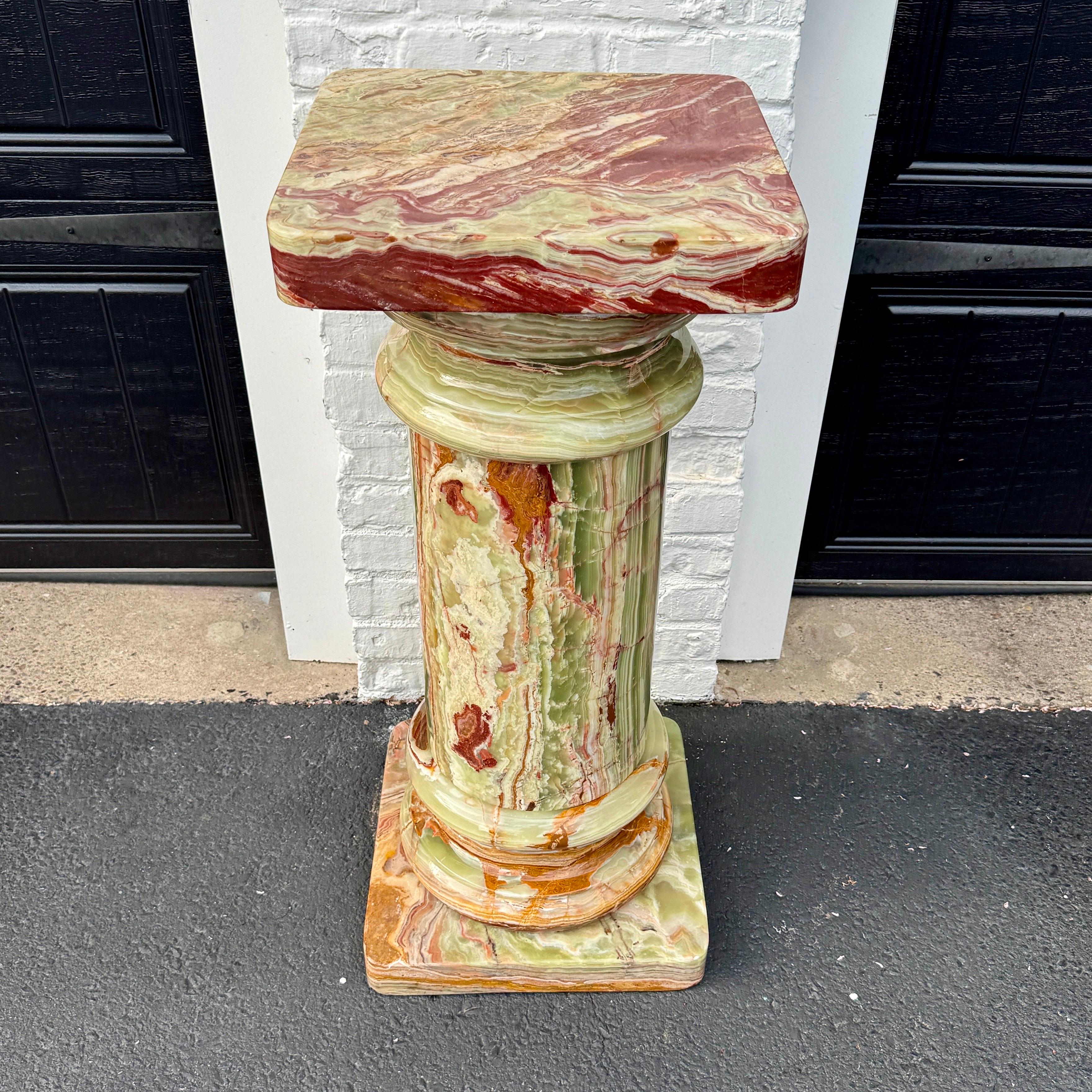 Large 20th Century Turned Onyx Pedestal Marble Column, Italy 1980's.
This amazing five piece pedestal has mostly a green, white and rust colored scheme. Perfect versatile piece to display your favorite sculpture or art piece. 
