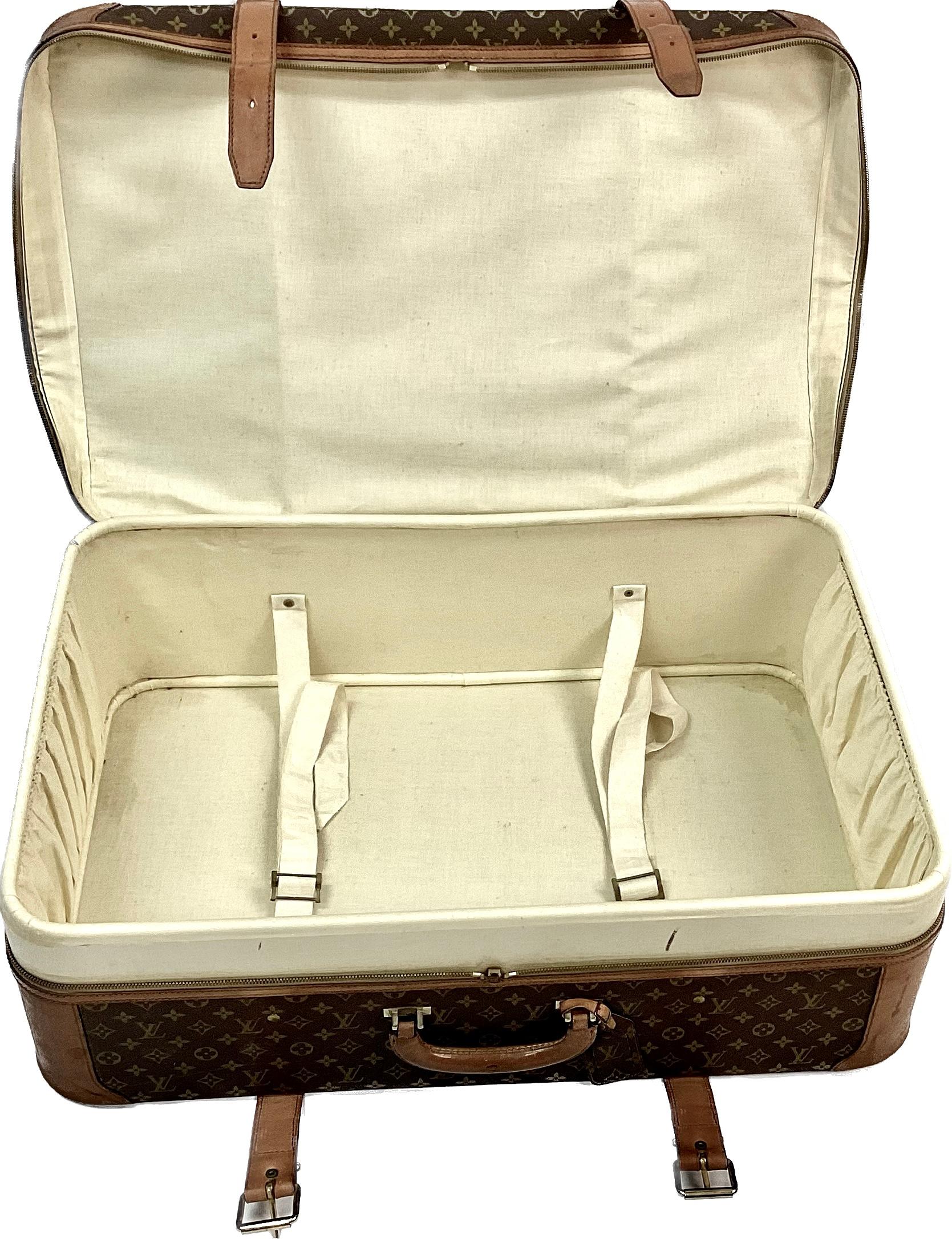 20th Century Large Vintage Louis Vuitton Double Strap Leather Suitcase For Sale
