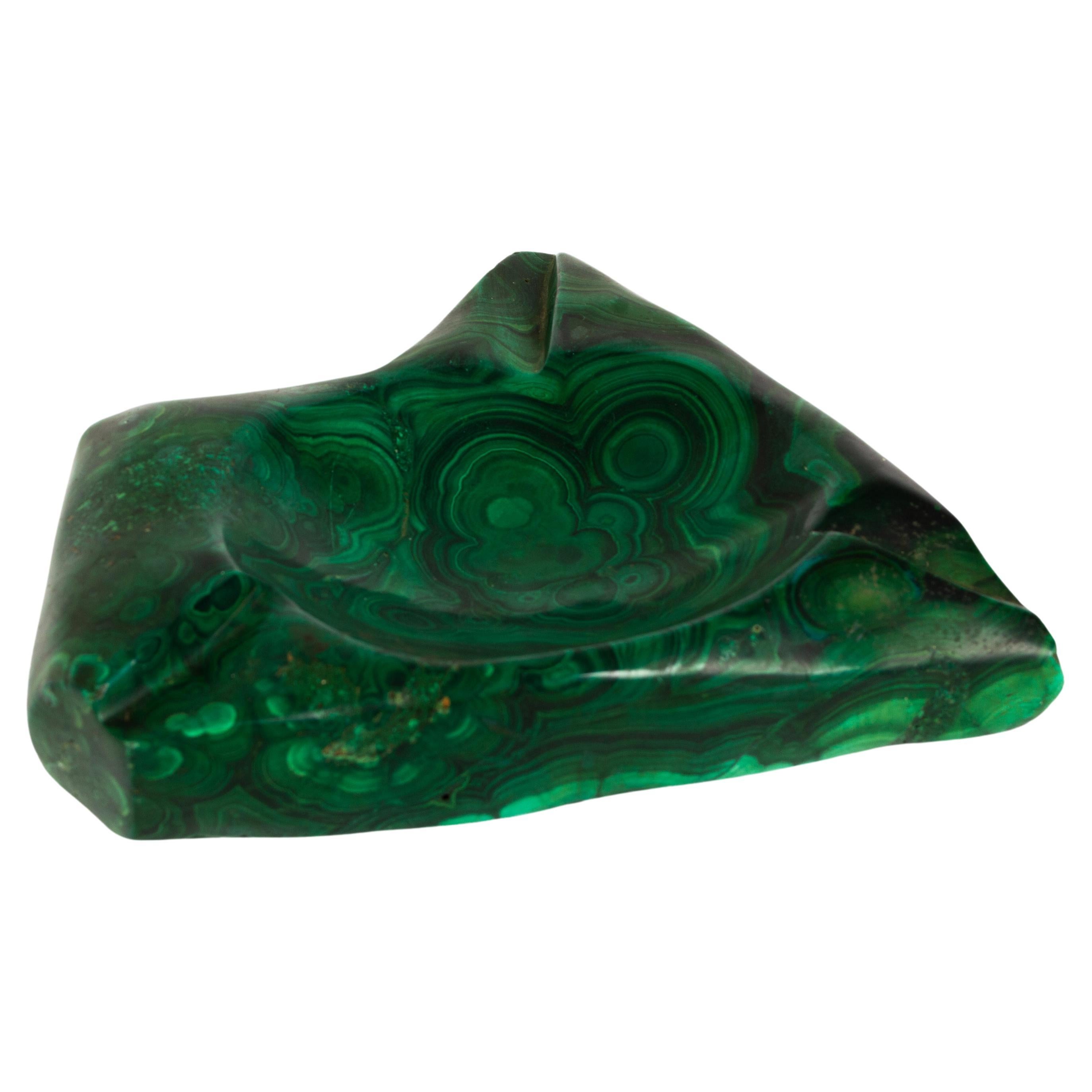 Large Vintage malachite natural stone vide poche trinket dish Italy, C.1960

A substantial piece of all natural malachite mineral stone. Polished beautifully to depict the natural pattern formation of this stunning rock. 
In excellent condition
