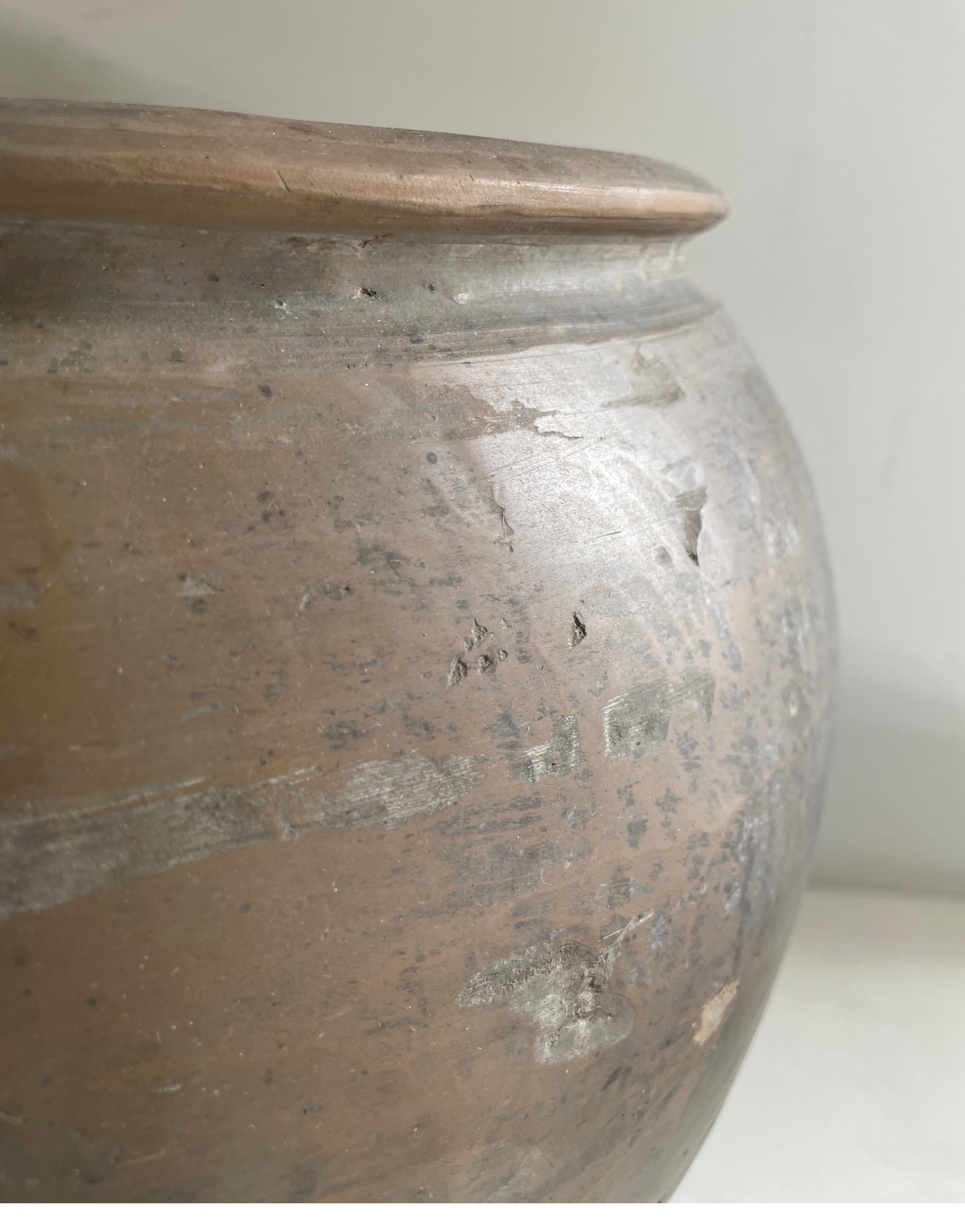 Vintage Matte oil pots Pottery beautifully terracotta rich in character, this vintage oil pot adds just the right amount of texture + warmth where you need it. Stunning matte finish with warm terra-cotta accents, and dark grey tones. Each piece is