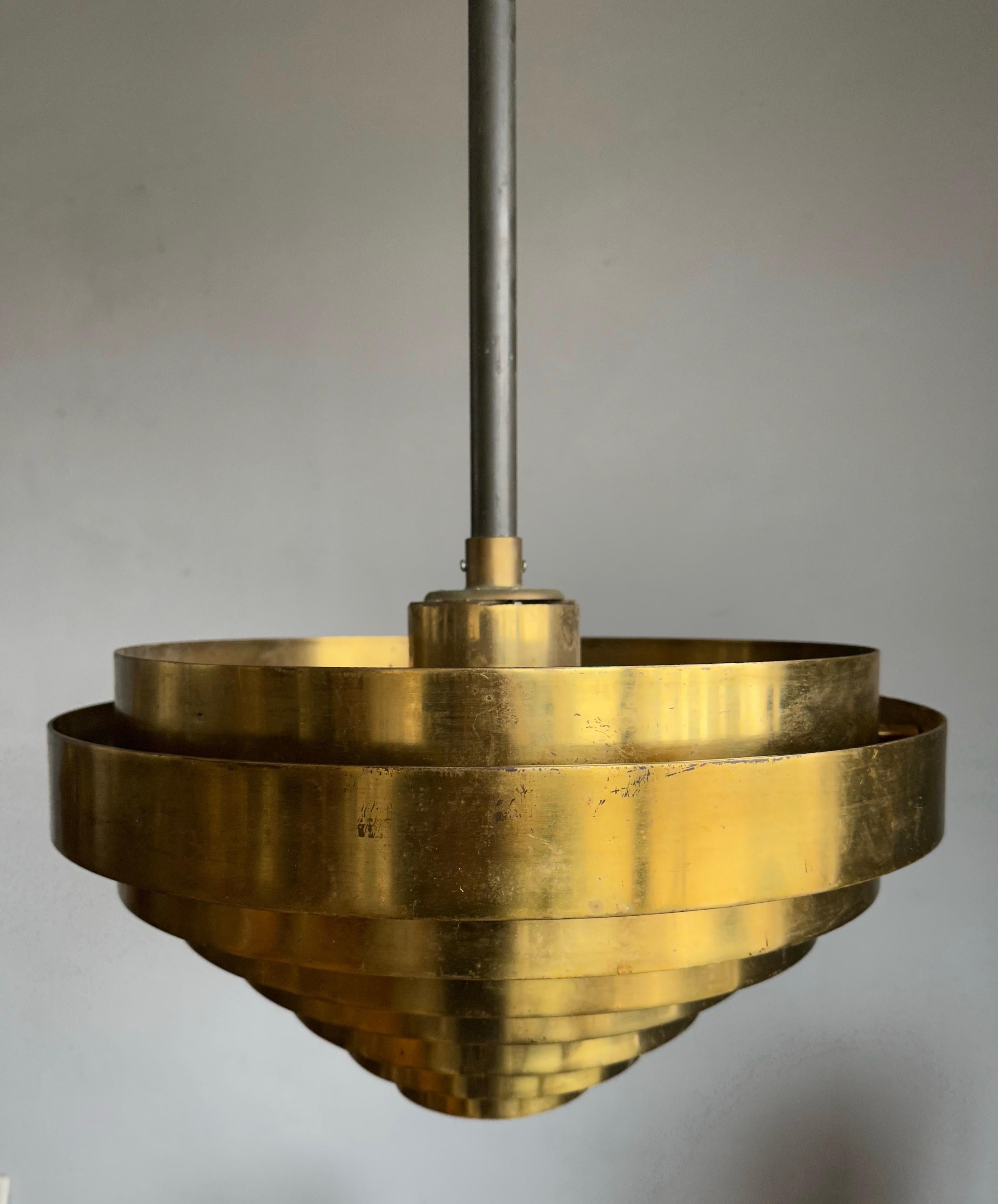 round brass pendant light