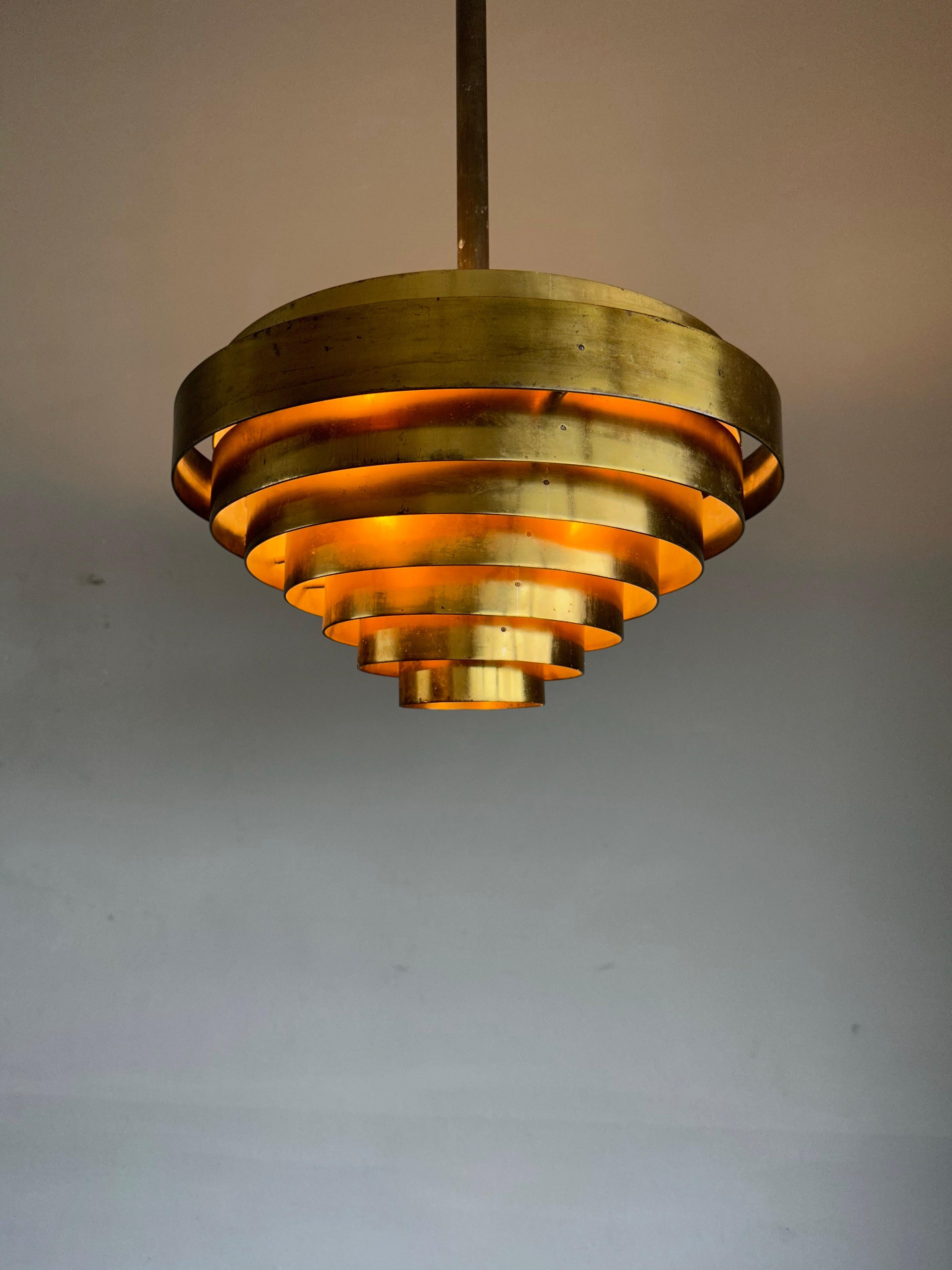 European Large Vintage, Mid-Century Modern Handcrafted Brass Round 8 Layers Pendant Light For Sale