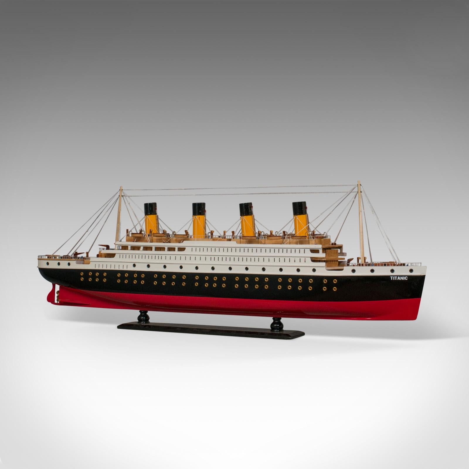 This is a large vintage model of the Titanic. An English, collectible model of the famous ship with display stand and lighting array, and dating to the 20th century.

The RMS Titanic is modelled here in its prime, with an array of flashing lights