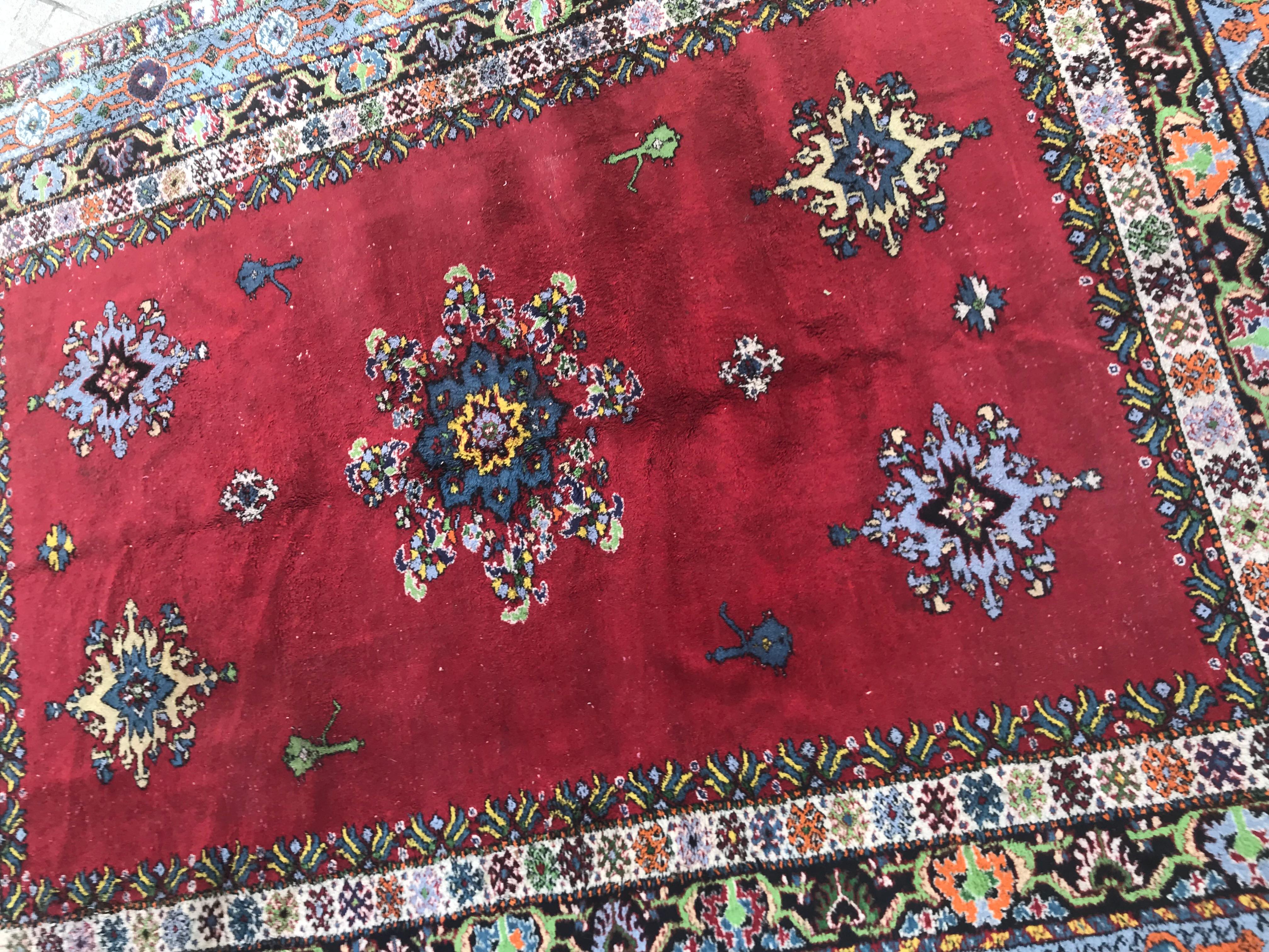 Nice large vintage Rabat carpet, mid-20th century, with beautiful colors and patterns, entirely hand knotted with wool velvet on cotton foundations.