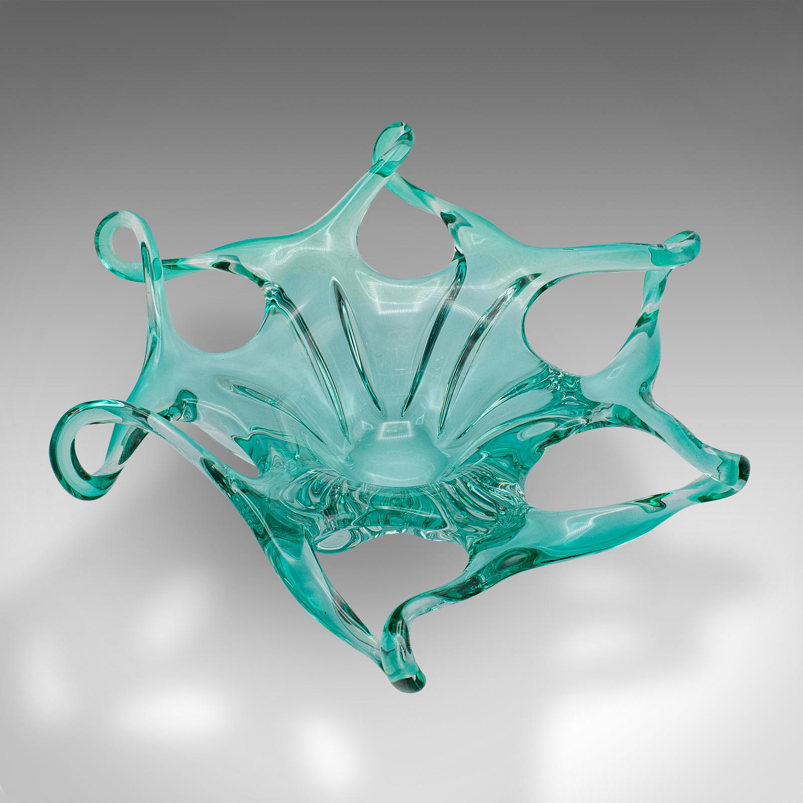 
This is a large vintage Murano fruit bowl. An Italian, art glass serving dish, dating to the late 20th century, circa 1970.

An explosion of glass, with fascinating forms and appealing colour
Displays a desirable aged patina and in good