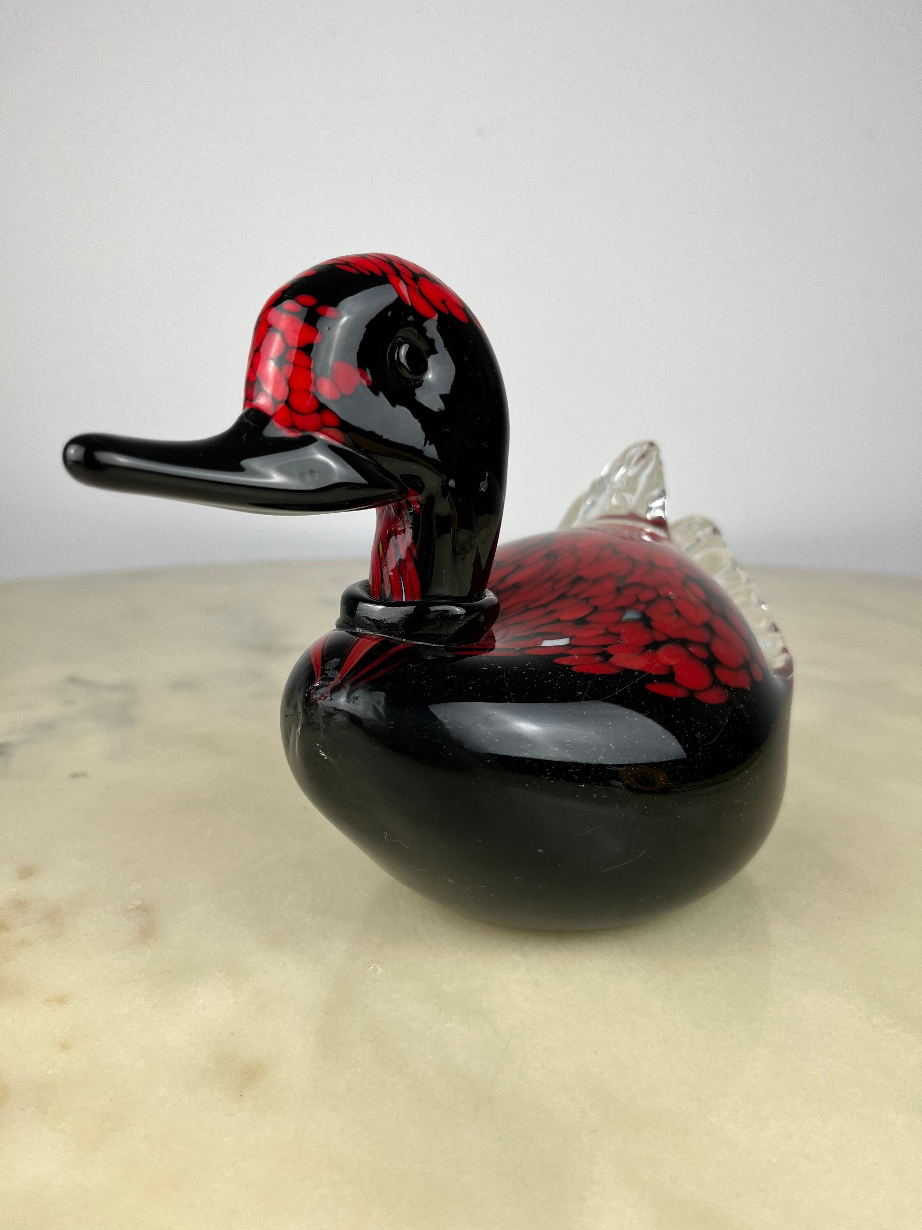 red glass swan