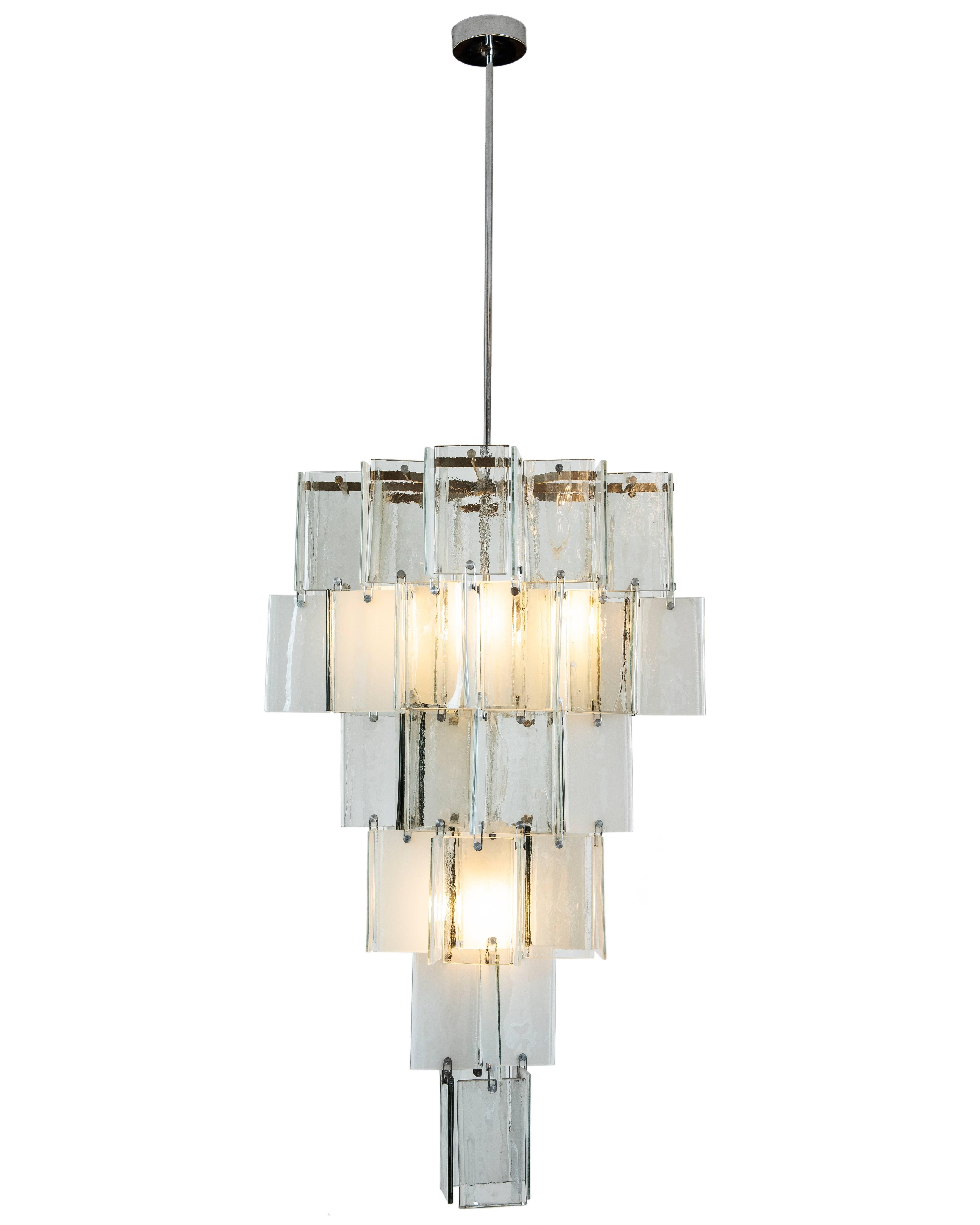 This important and unique Murano light originates from a Toronto home. It was custom-made for the client in the 1970s using handblown opaque clear and white glass pieces attributed to AV Mazzega. The body of fixture with glass measures 48