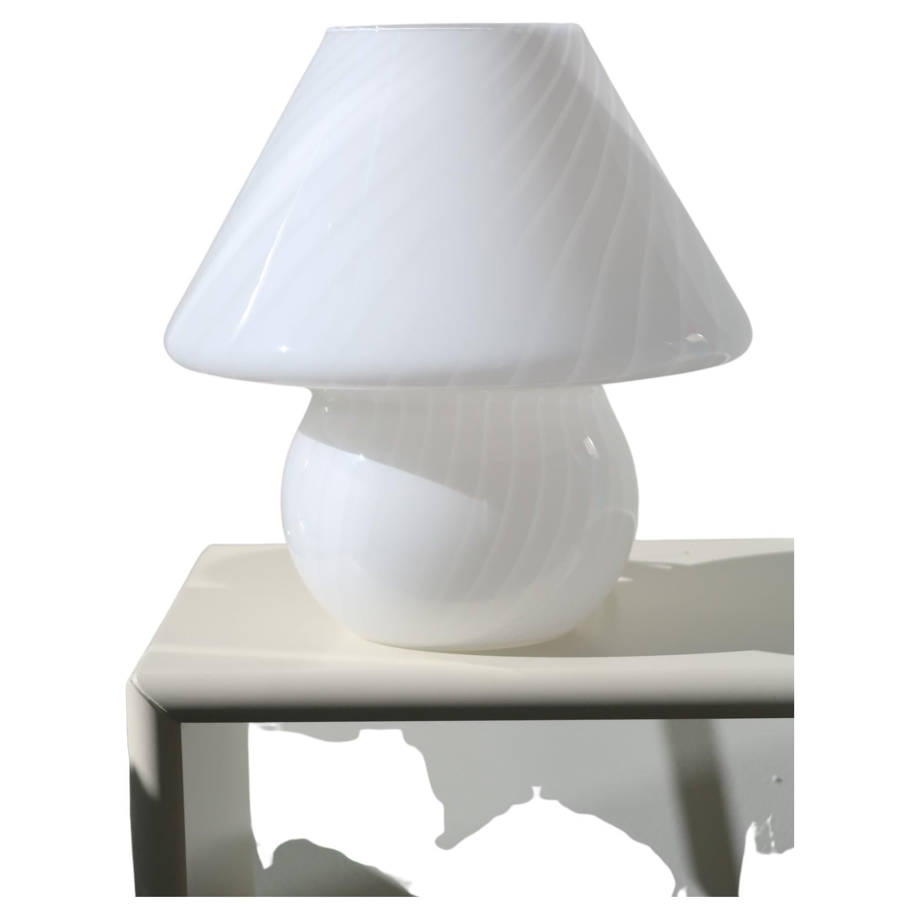 Vintage large Murano white mushroom table lamp with swirl pattern. Mouth blown in one piece of glass. Gives a really nice light in the dark evenings. Handmade in Italy, 1970s, and comes with new white cord. Measures: H:36 cm D:34 cm.
 