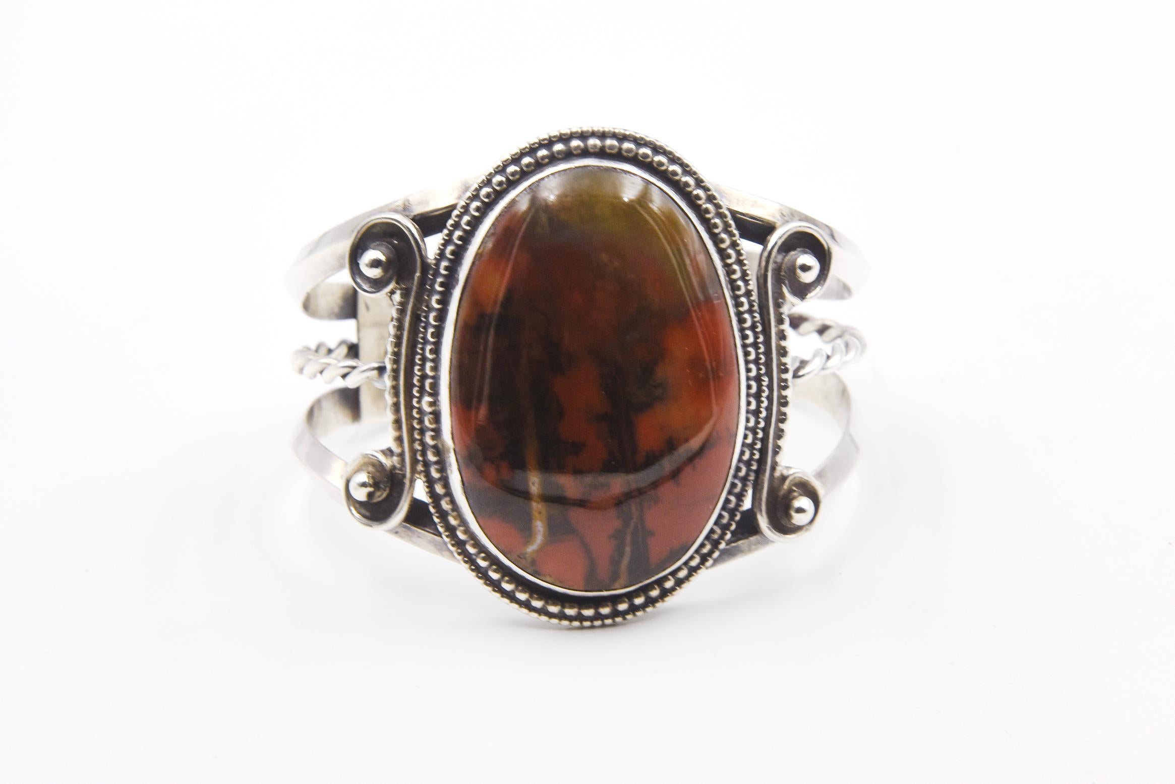 Vintage Native American hand made cuff bracelet featuring a large, oval cabochon piece of agate measuring approximately 1.86