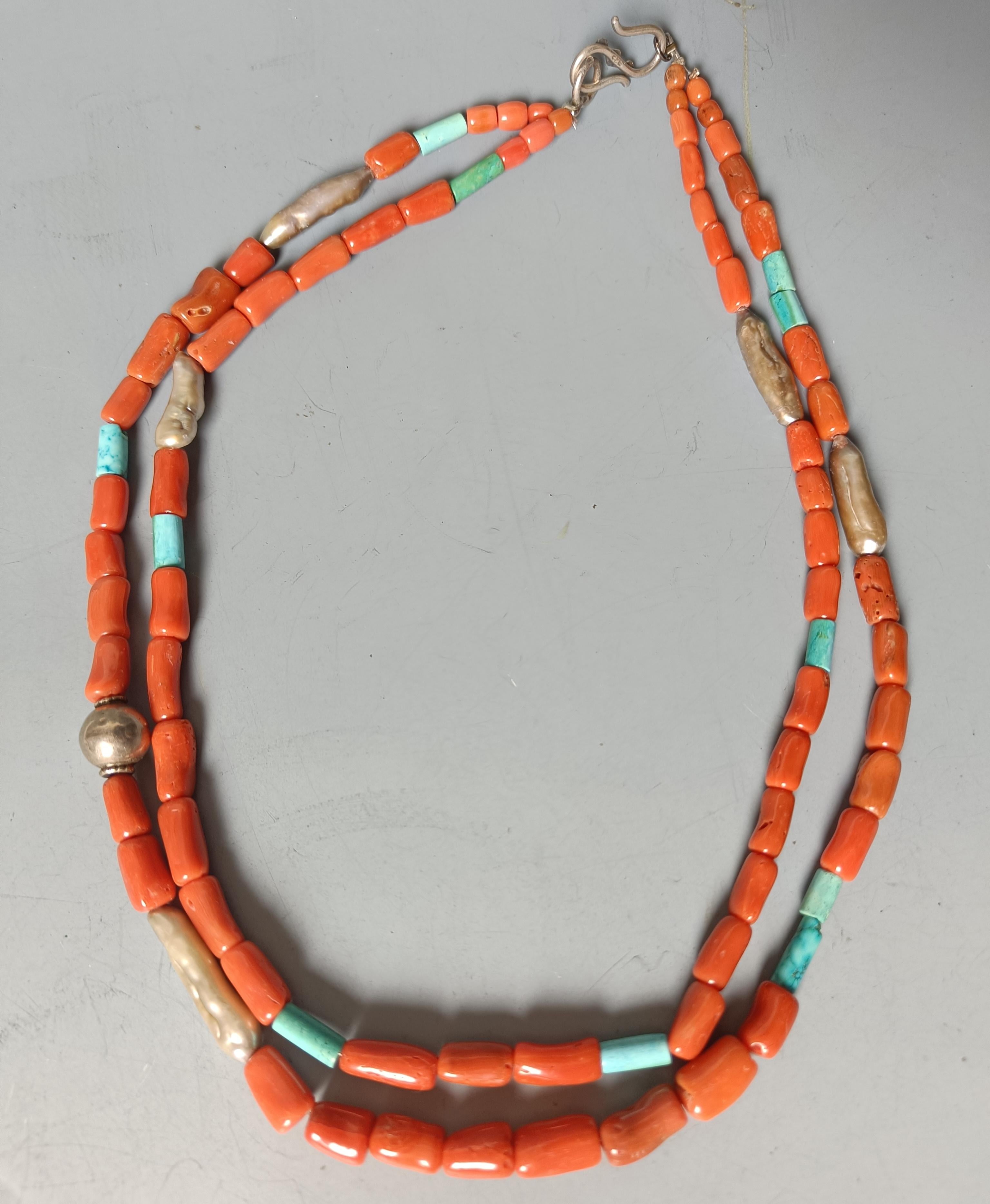 Large Vintage Native American South West style Coral turquoise Necklace
A double string of Large high quality natural red coral beads with turquoise and natural elongated pearls
Vintage Circa 1960`s  or earlier, coral beads size 1 cm x 6 mm average
