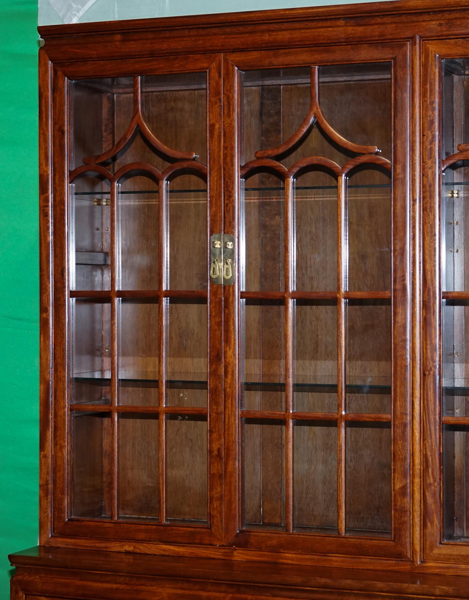 
Antiques of London



This impressive, large-scale vintage Chinese display cabinet is crafted from solid wood and richly detailed with both glazing and carving. A commanding piece, it combines traditional craftsmanship with functionality, offering