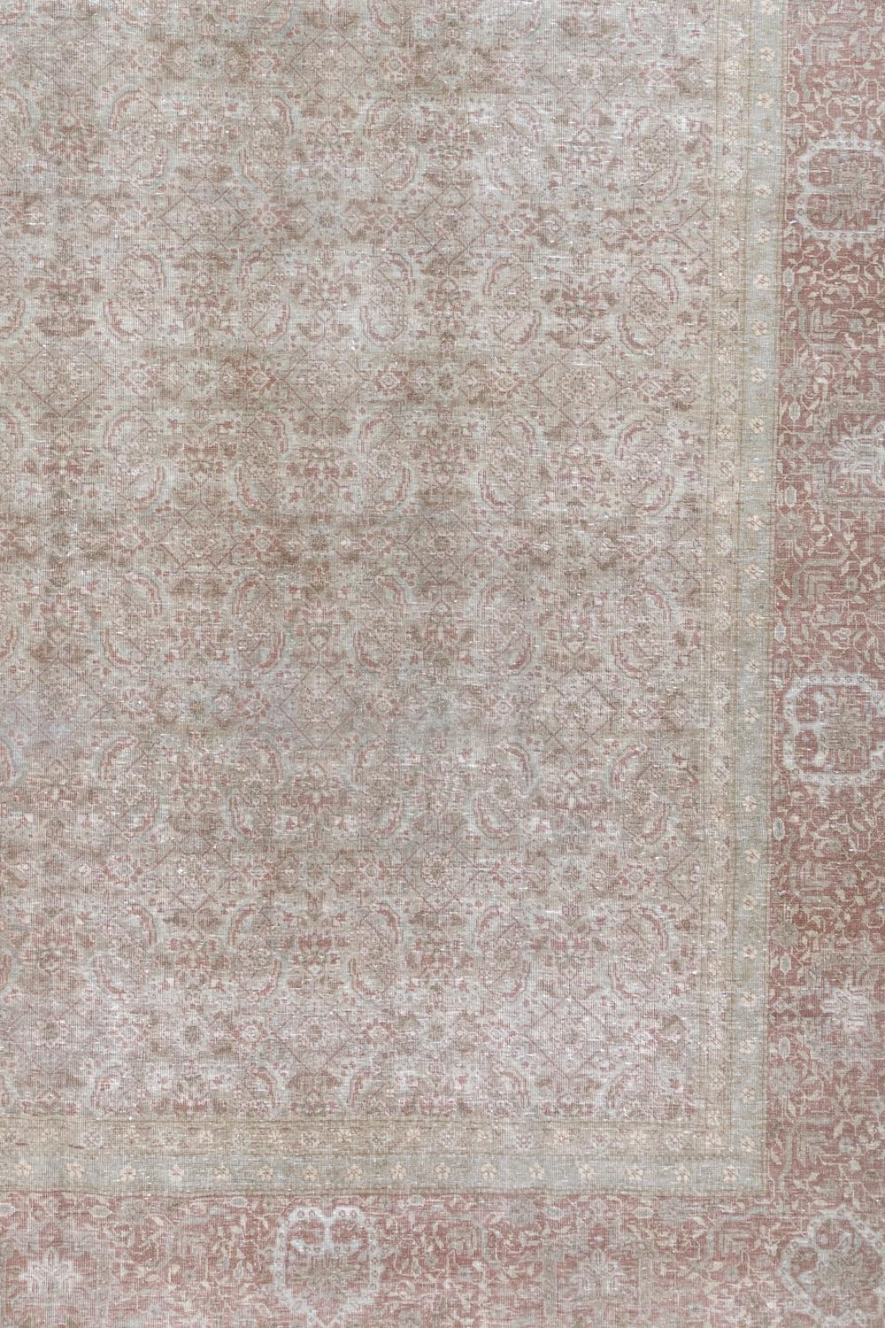 Age: Circa 1940

Colors: off white, taupe, mauve, light gray, sage

Pile: low

Wear Notes: 2

Material: wool on cotton

Room size vintage Persian rug with an all over pattern. 

Vintage rugs are made by hand over the course of months,