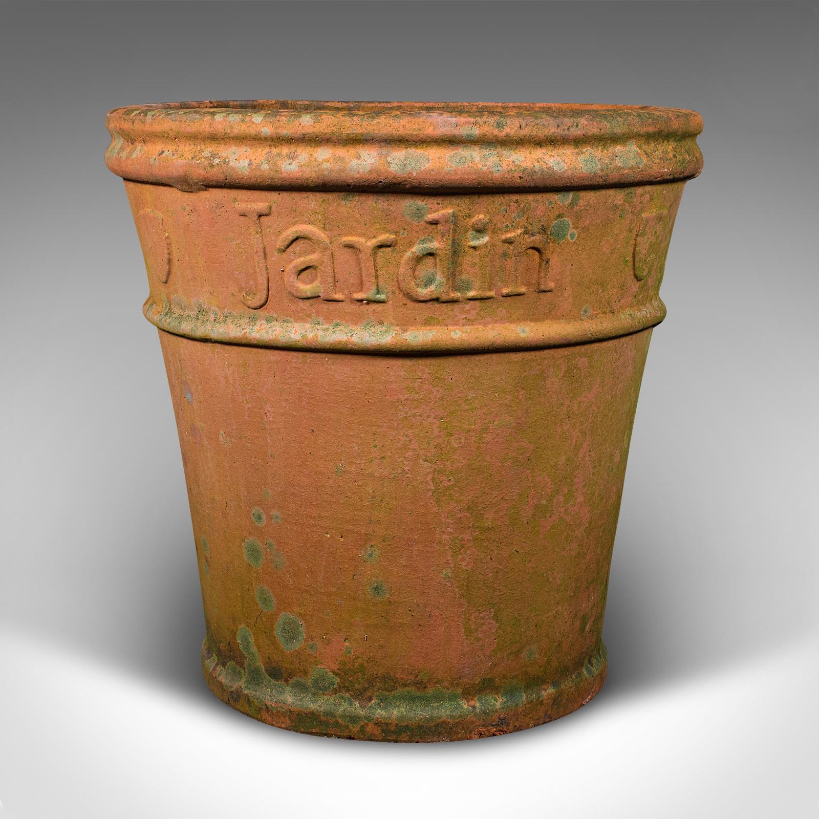This is a large vintage ornamental tree planter. A French, terracotta jardiniere pot, dating to the mid 20th century, circa 1950.

Delightfully substantial and generously sized, ideal for olive or bay trees
Displays a desirable aged patina with