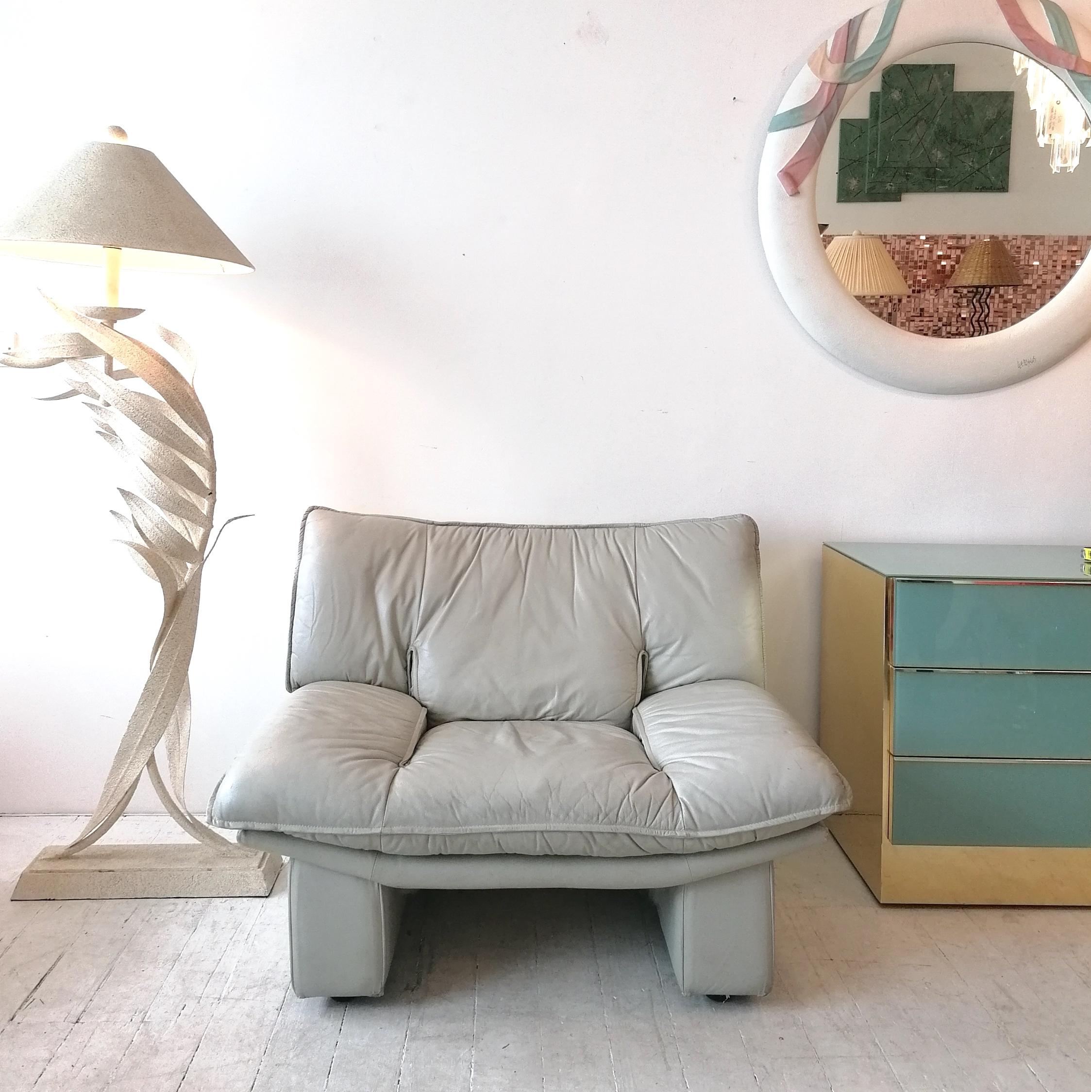 This stylish large postmodern pale grey leather armchair is by Nicoletti Salotti, Italy, 1980s. In good vintage condition- some age-related scuffs and scratches (see photos). Lovely soft leather & a very comfortable & generously-sized chair.
No
