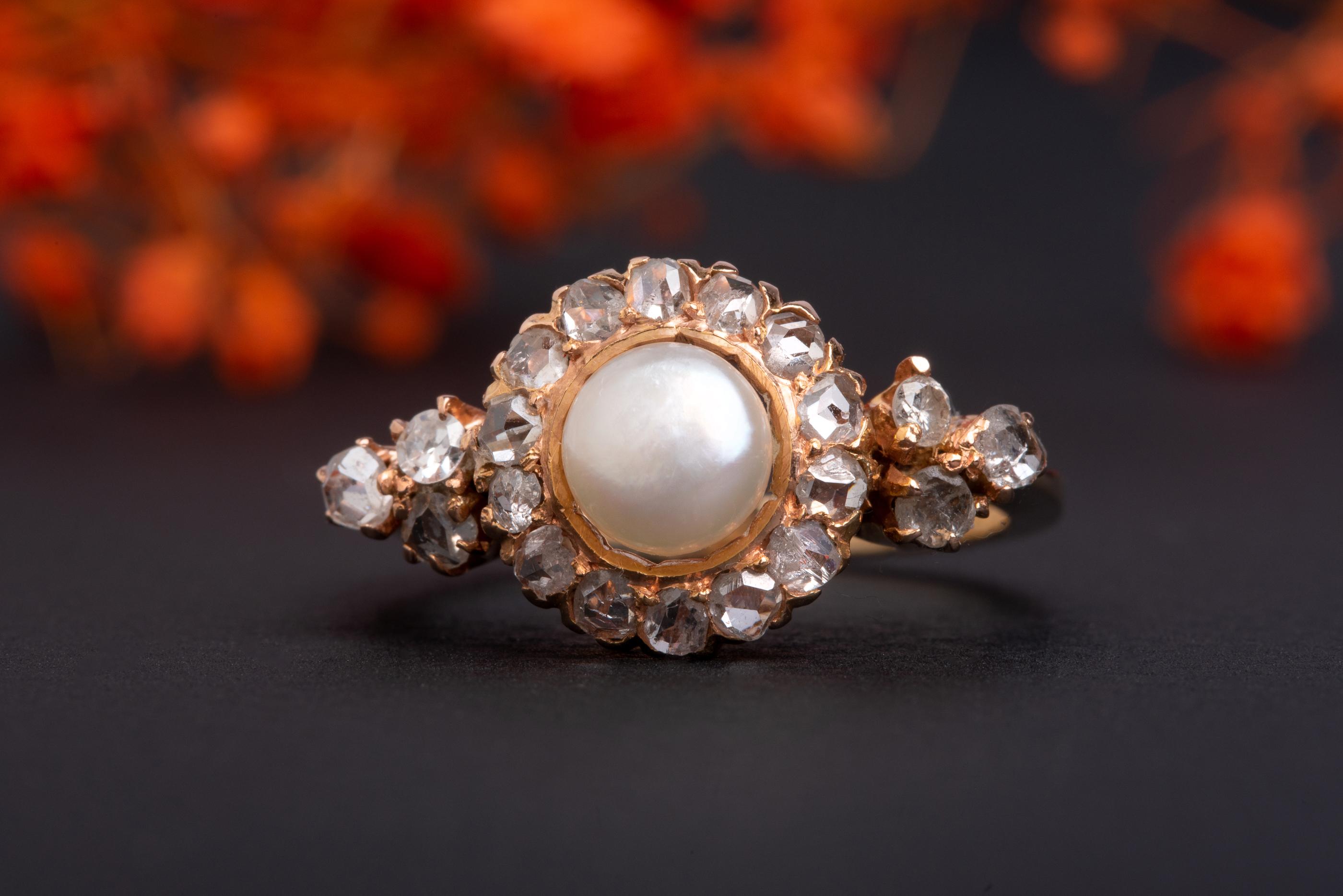A beautiful and massive (almost 6 grams of solid high carat gold!) vintage diamond set with a lovely snow-white pearl. 

This ring stunning midcentury comes from a private collection in Italy and is preserved in an outstanding condition. It is now