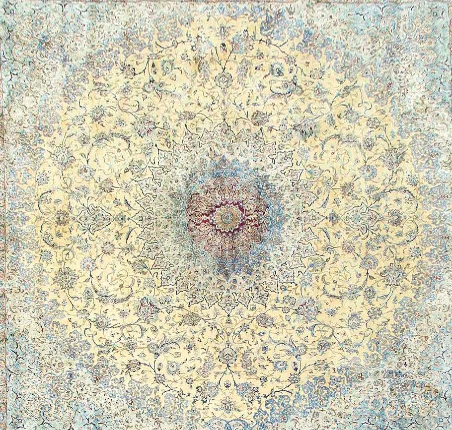 A palatial rare vintage Persian Nain hand knotted square 100% silk rug. At the center a complex circular medallion with arabesque detail spews forth a lush tangle of spiraling Fine vines and palmettes, all against a warm cream ground, with accents