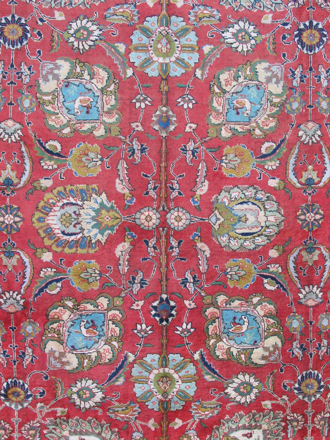 Soft red background, ivory and blue, Tabriz rug from Persia with Repeating Geometric design, rug H-411-63, country of origin / type: Iran / Tabriz, circa 1950

This vintage Persian Tabriz carpet (circa mid20th century) features a refined palate of