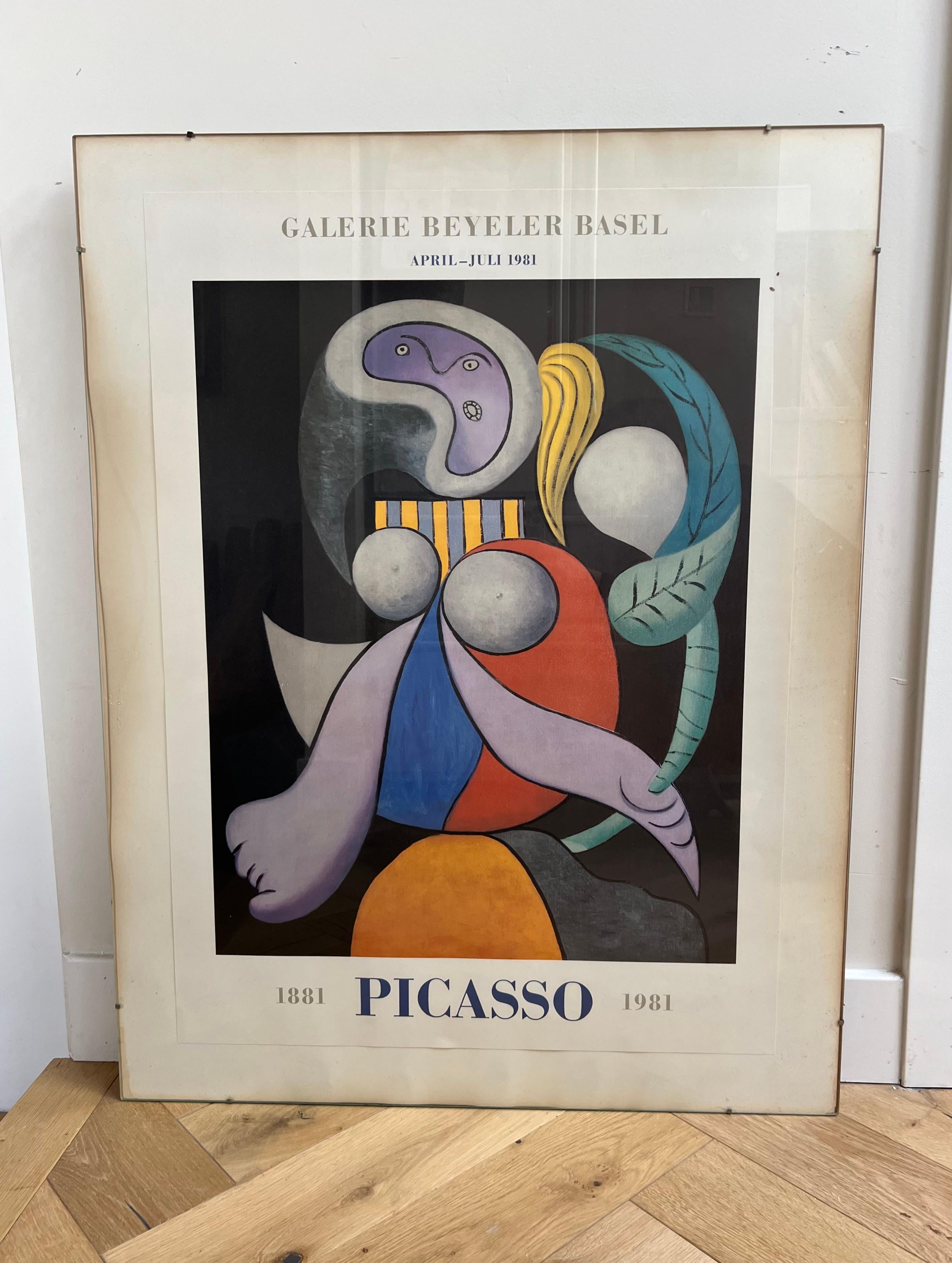 An original authentic vintage Picasso exhibition poster from Gallery Beyeler Basel, 1981. The poster is mounted on wood, behind glass, and ready to hang. The poster depicts one of his Picasso’s seminal works « Femme a La Fleur » from 1932, a