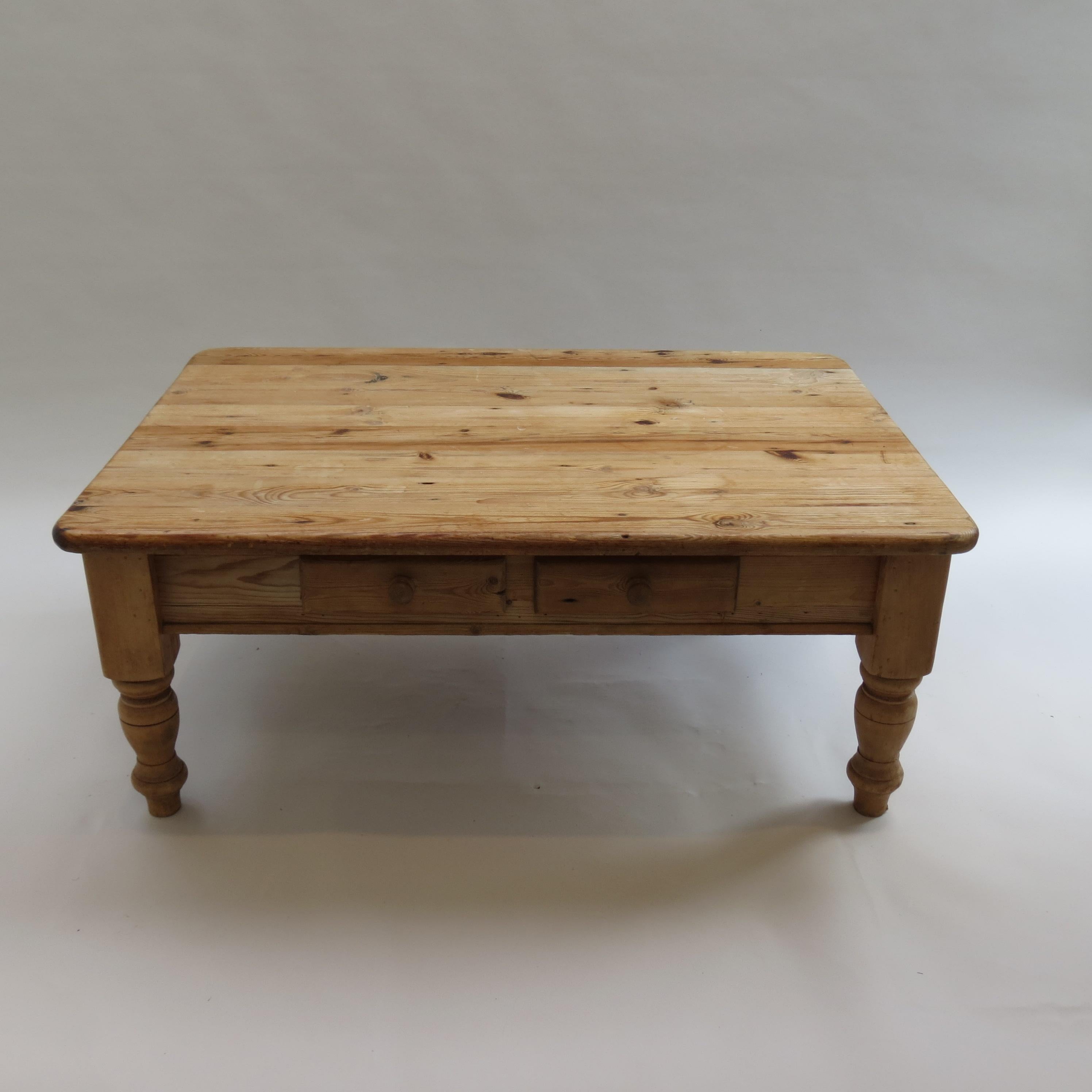 Fabulous pine coffee table made from reclaimed timber, probably put together in the 1990s, the wood has some age to it.  Well made and the wood has a wonderful mellow colour to it through time.  Good size, the proportions stand well, two drawers to