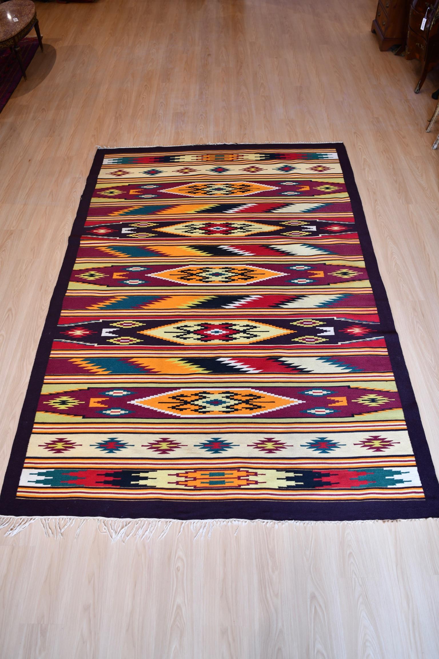 Large vintage Rio Grande blanket with colorful geometric decoration. Dimensions: 117
