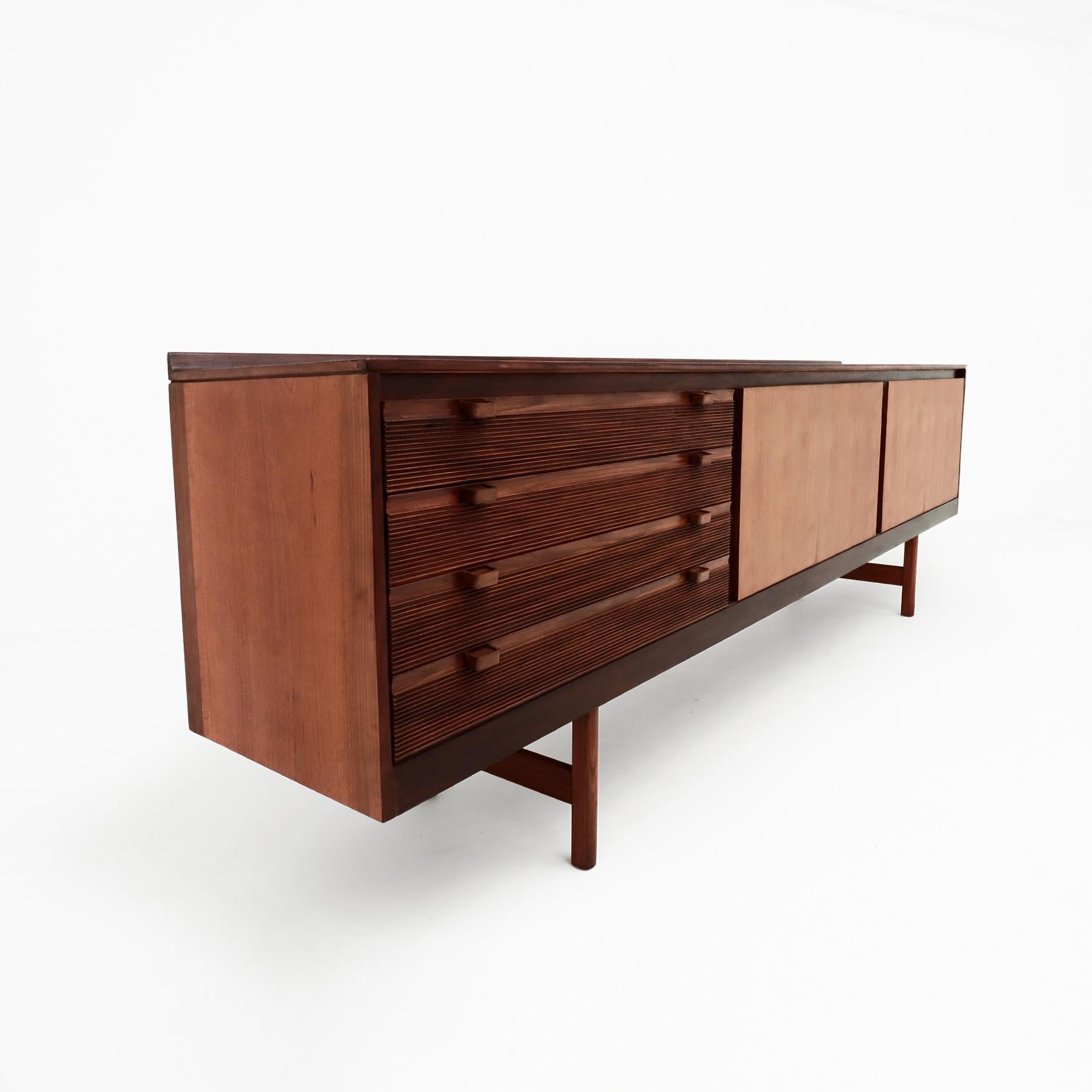 A very large Vintage Mid Century Teak, Afromosia and Sapele Knighstbridge sideboard/credenza designed by Robert Heritage for Archie Shine.

Standing at just over 244cm in length the Knightsbridge really was the Grand Daddy of all Heritage’s amazing