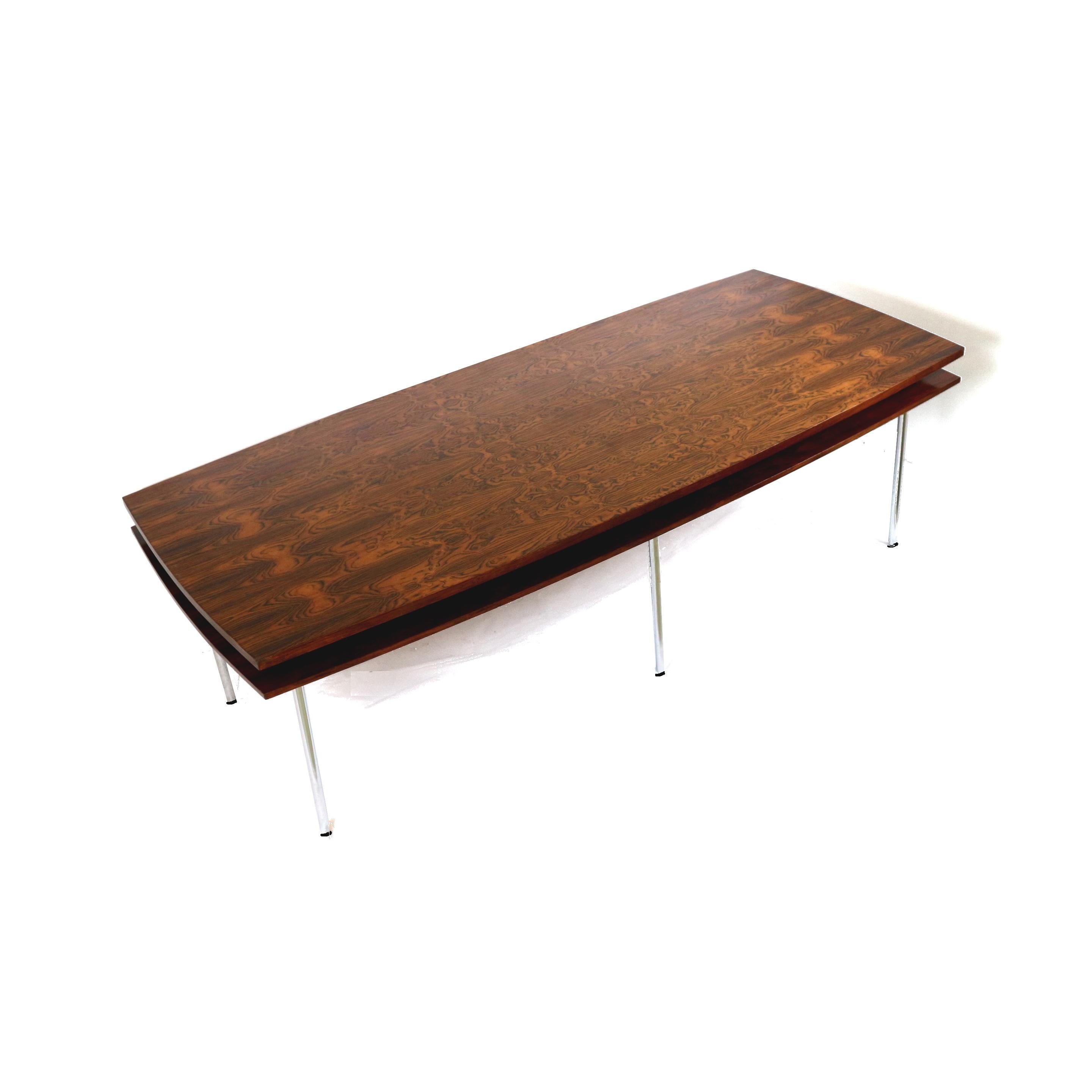 Large vintage rosewood conference table / dining table made in the 1960s.

Dimensions:
Length: 249 cm
Depth: 109.5 cm
Height: 74.4 cm

The table has signs of use appropriate to its age.
