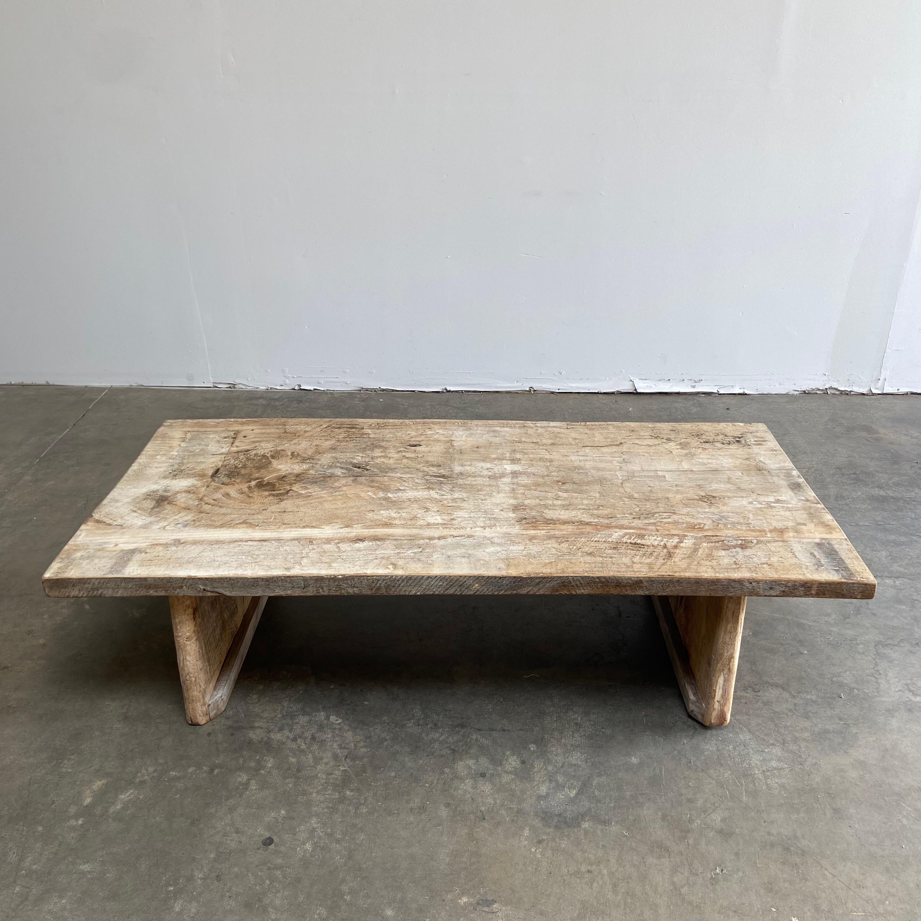 Teak coffee table 63”W x 32”D x 18”H
This item has been modified from its original version custom for you.

Beautiful rustic finish, solid and sturdy. Ready for everyday use.
Natural raw teak will age over time. Can be sealed if desired.