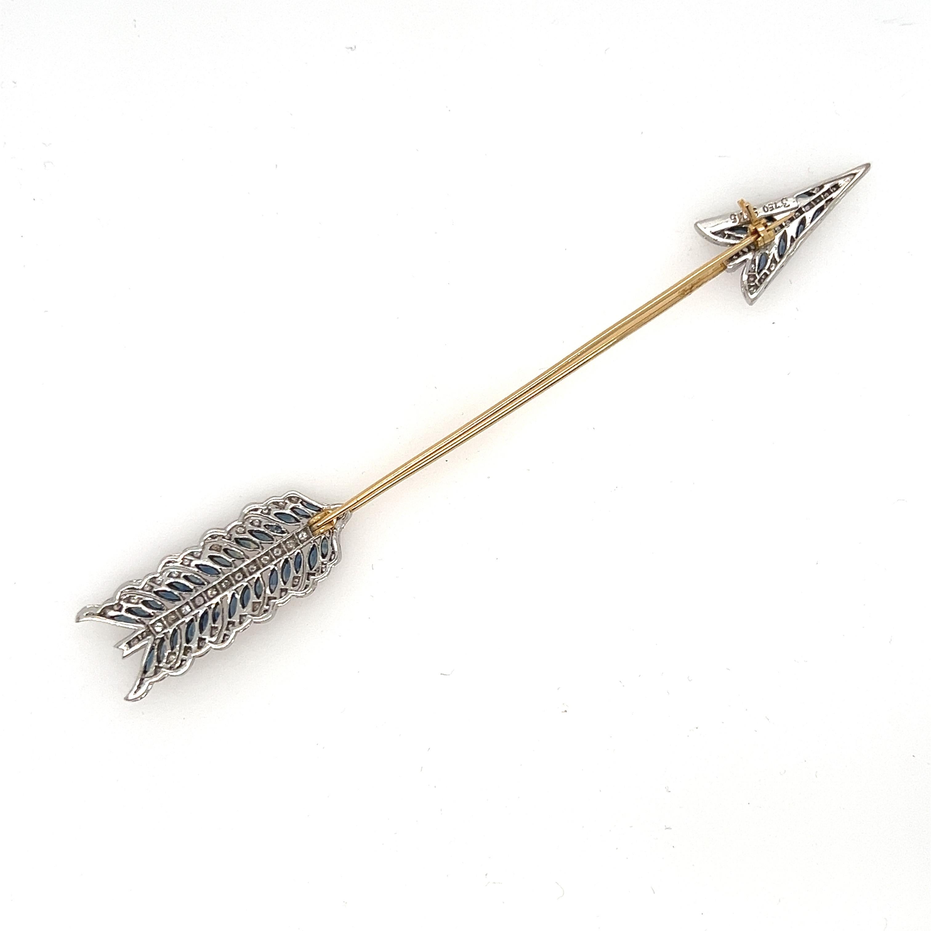 Oh I LOVE this special find so much - it's really going to be a hard one to let go! Crafted in 18K Yellow and White Gold, the design features a great Arrow Jabot Pin, highly detailed with Pave Set Diamonds, gorgeous Sapphires, and detailed