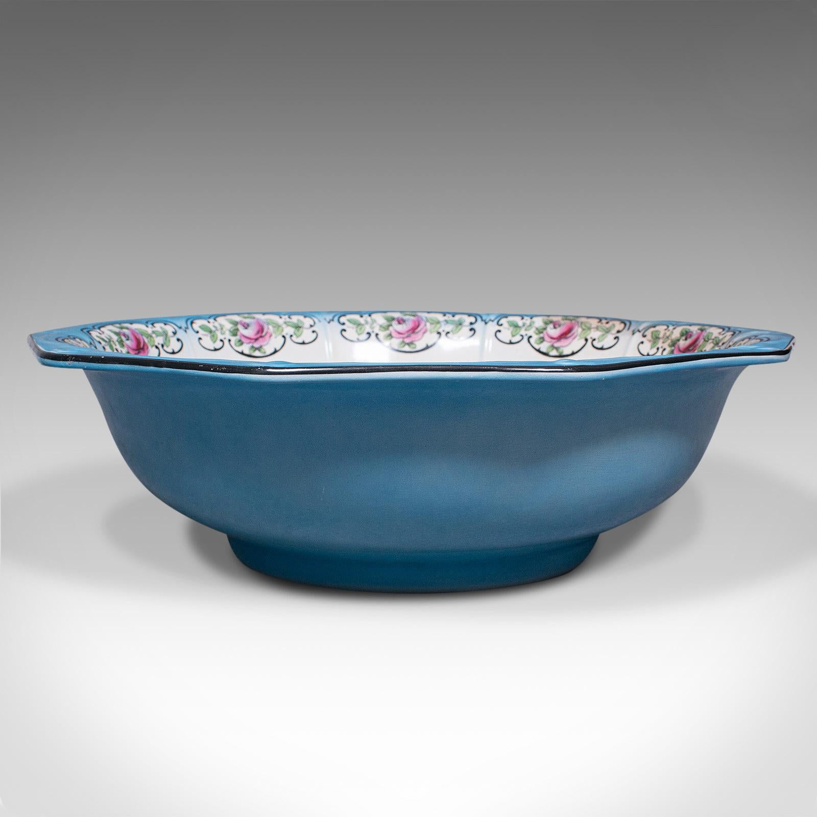 This is a large vintage serving bowl. An English, ceramic fruit dish, dating to the mid 20th century, circa 1930.

Graced with wonderful colour and generous proportion
Displays a desirable aged patina throughout
Bright blue ceramic body with