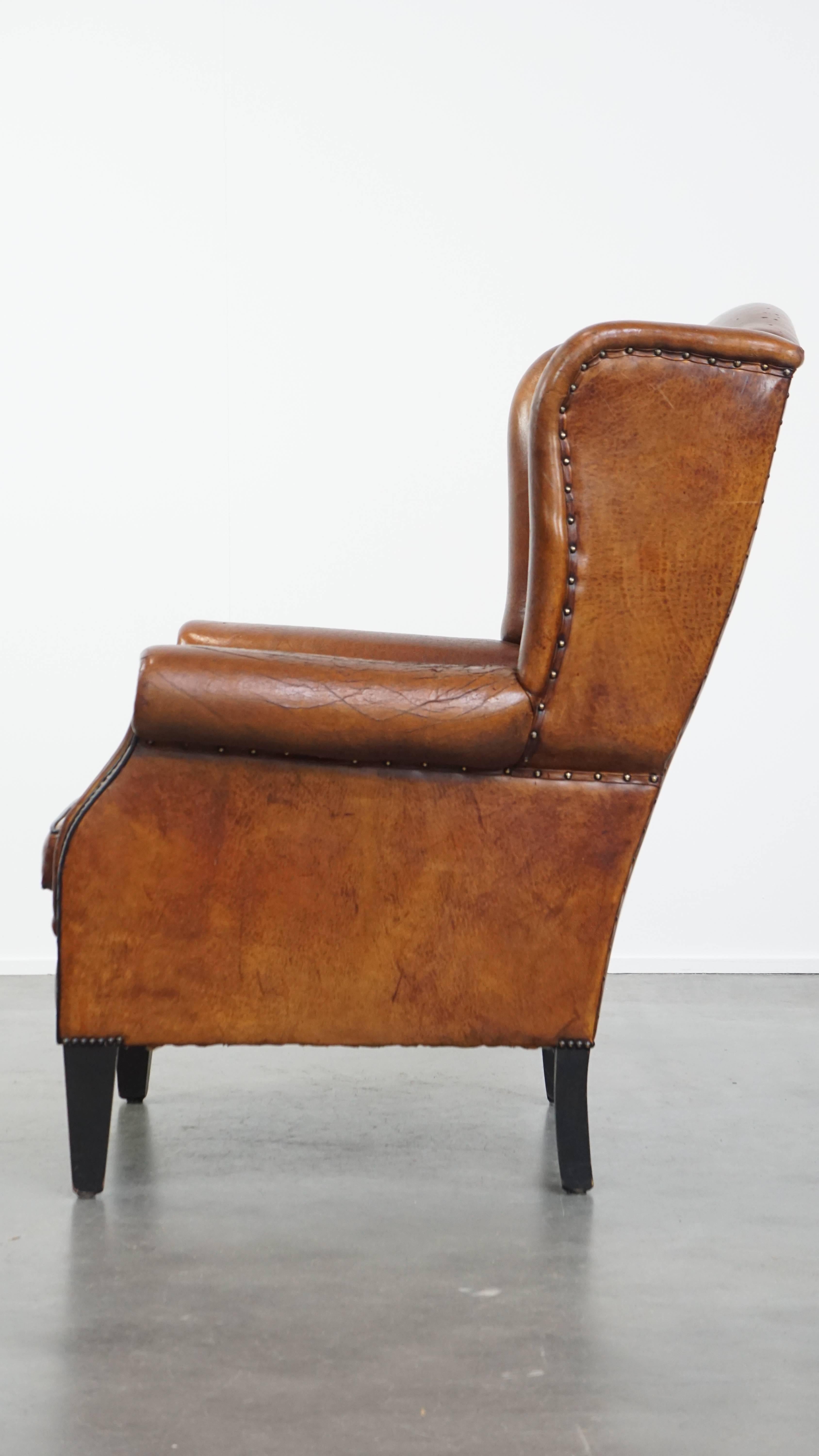Grande sedia Wingback in pelle di pecora d'epoca In condizioni discrete in vendita a Harderwijk, NL