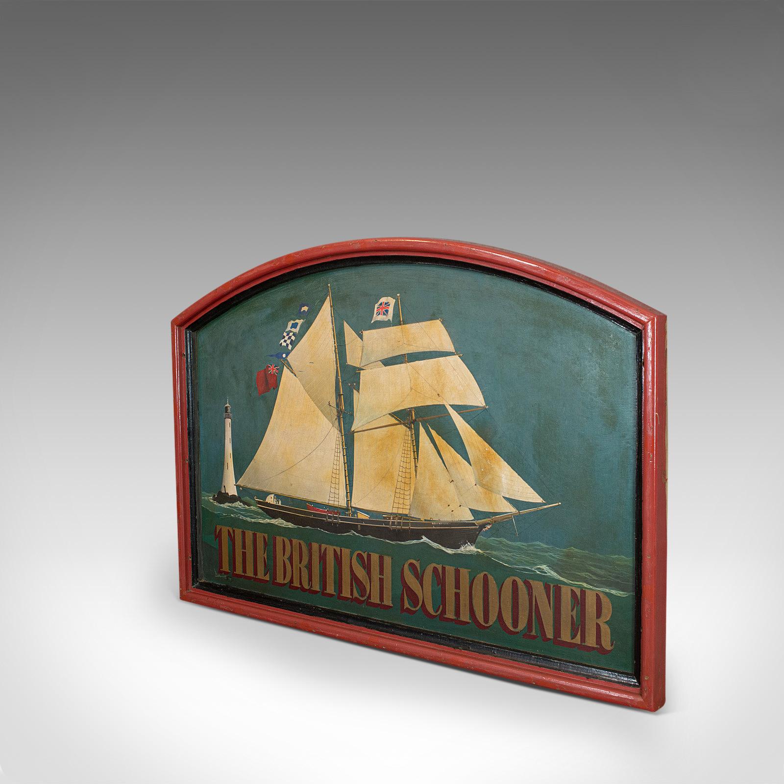 This is a large vintage ship pub sign – The British Schooner. An English, pine bar billboard with maritime theme and dating to the mid-20th century, circa 1950.

Impressive scale and nicely decorated
Displays a desirable aged patina
Hand painted