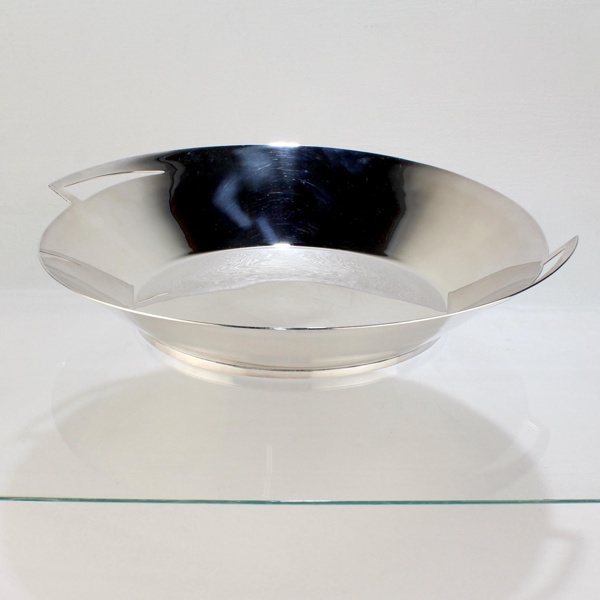 A fine 'Lily' silver-plated bowl.

Designed by Elsa Rady for Swid Powell.

Model no. 3320.

Together with its original box and paperwork insert.

Swid Powell was the highly acclaimed New York City based tableware company founded by Nan Swid and