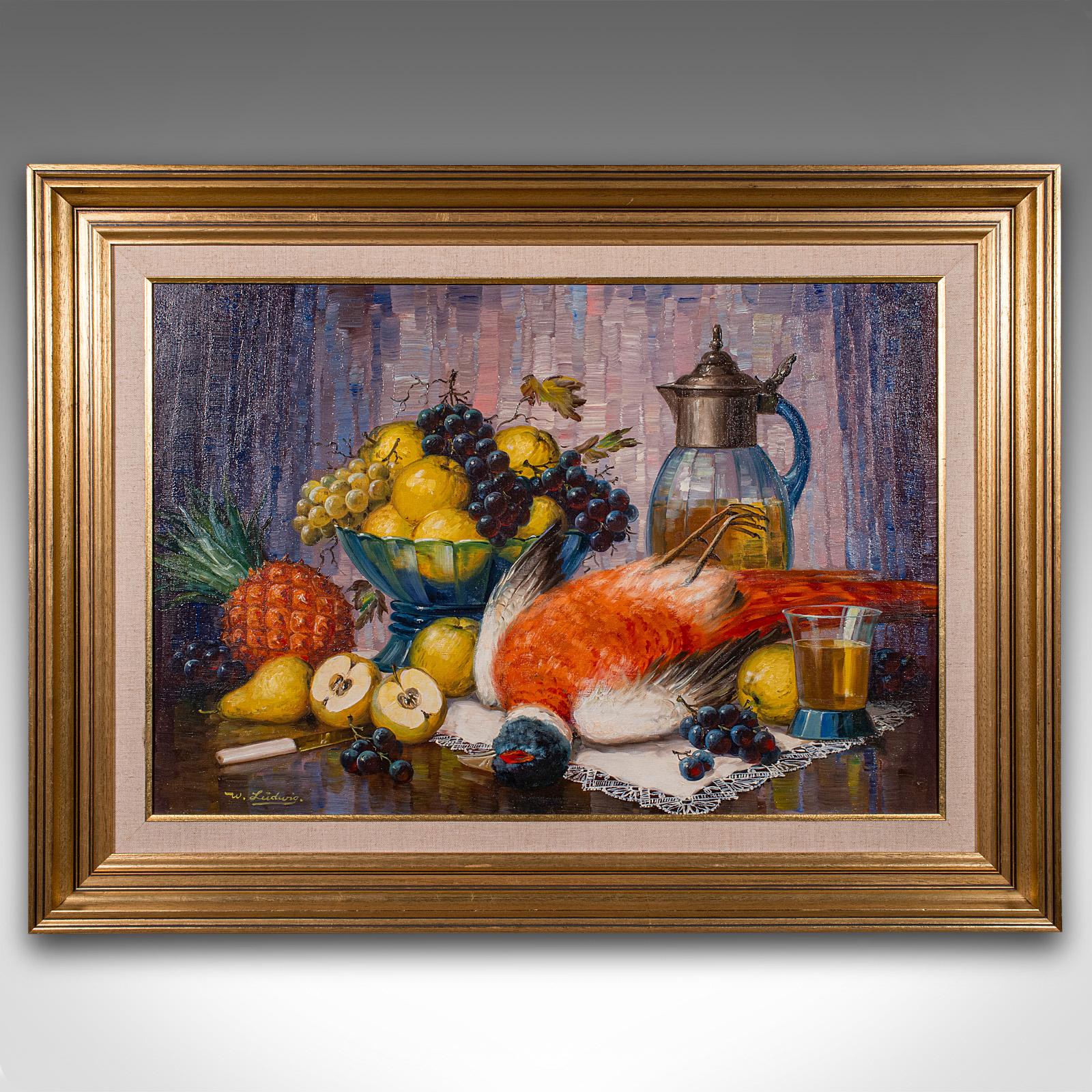 
This is a large vintage still life painting. A German, framed oil on canvas titled Stilleben mit Fasan, dating to the late 20th century, circa 1970.

Fine example of traditional still life, with great colour
Displays a desirable aged patina and in