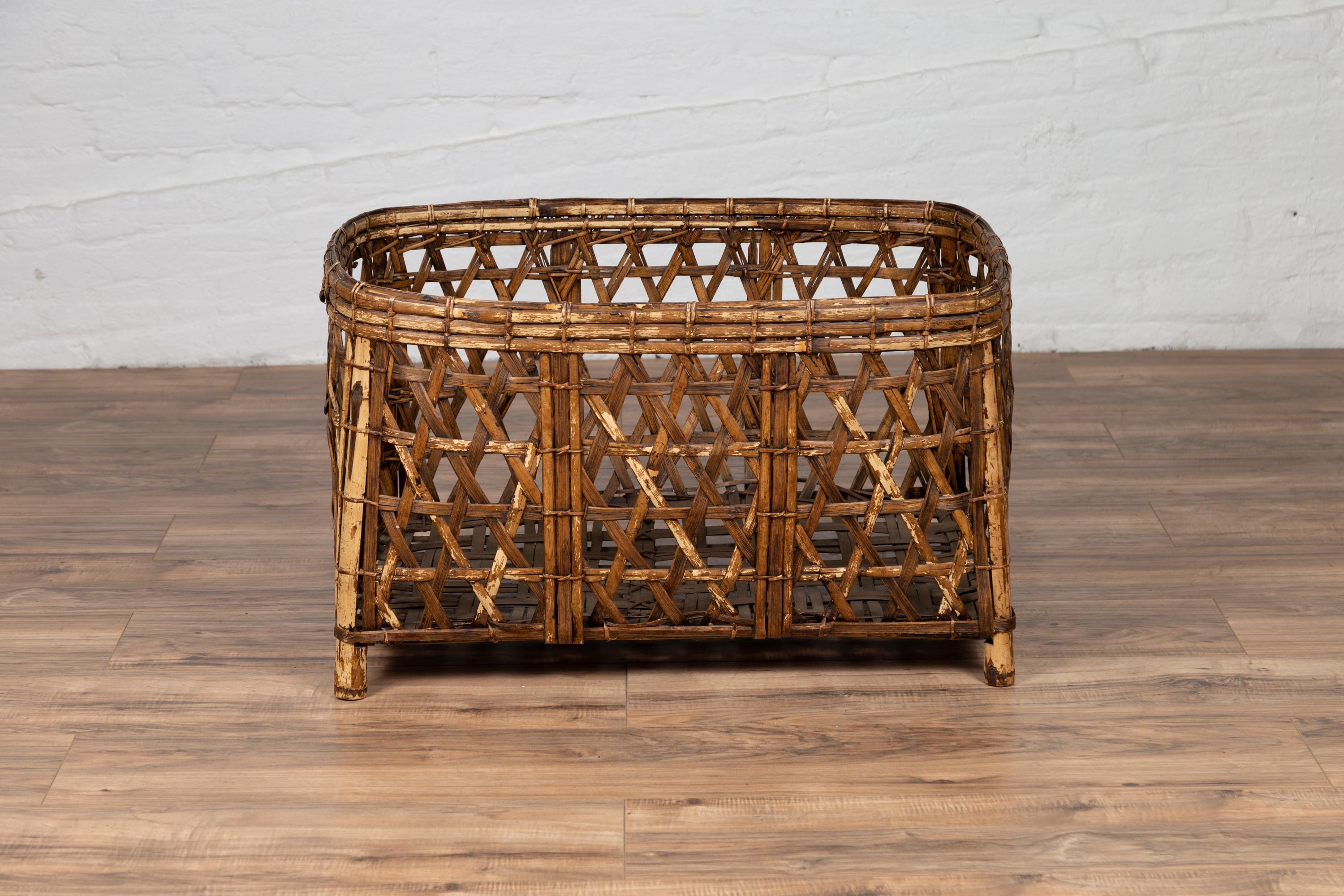 Thai Large Midcentury Bamboo Fretwork Basket Raised on Short Feet, circa 1950 For Sale