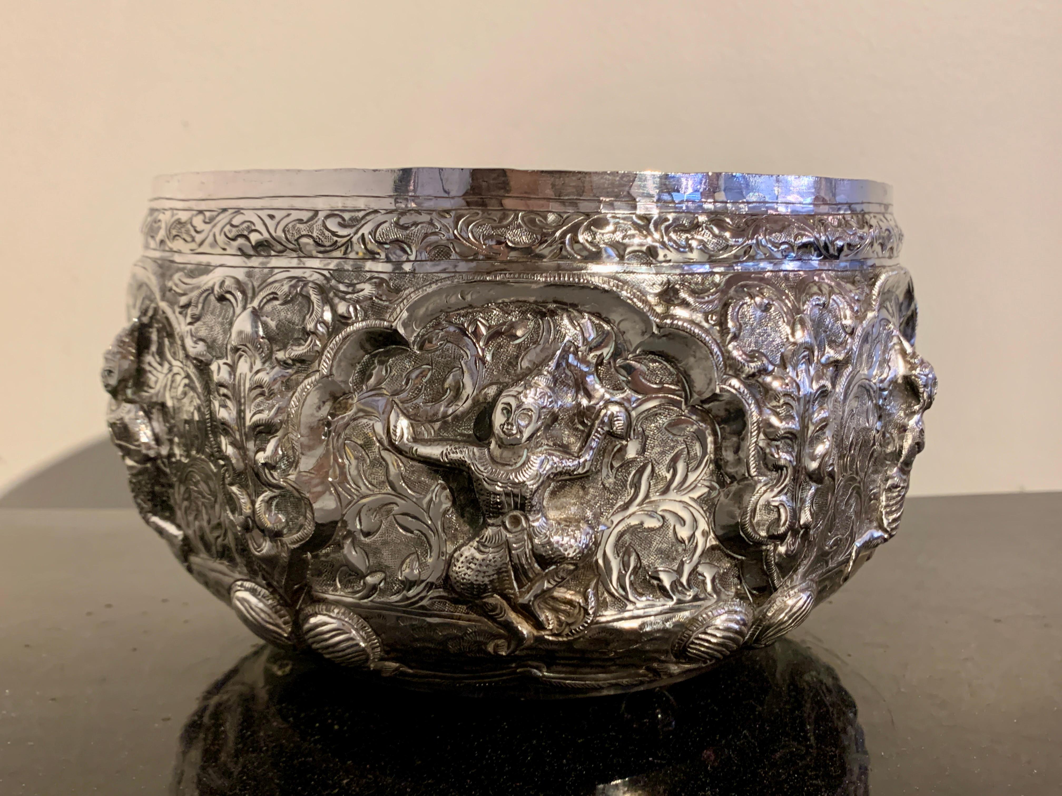 A large and impressive vintage Thai silver offering bowl by Damrong Silp Silverware, circa 1960's, Chiang Mai, Thailand.

Beautifully hand crafted using traditional methods, the large silver bowl features images of Thai classical dancers in