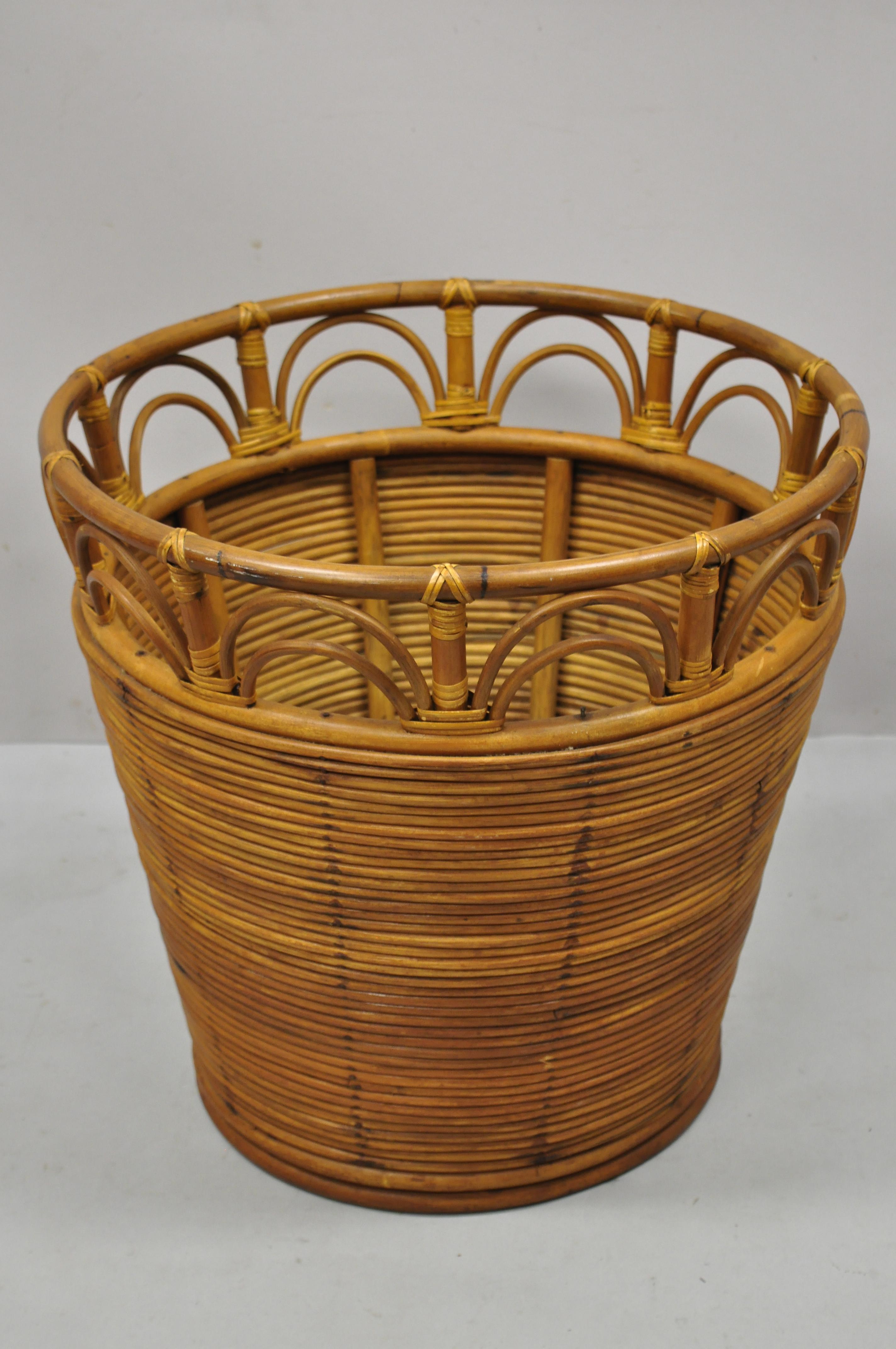 Large vintage Tiki Beach Boho Chic Regency Wicker rattan bamboo quilt basket. Item features large wicker frame, open interior, great for throw blankets, quilts, or magazines. Circa 1970s. Measurements: 19.5