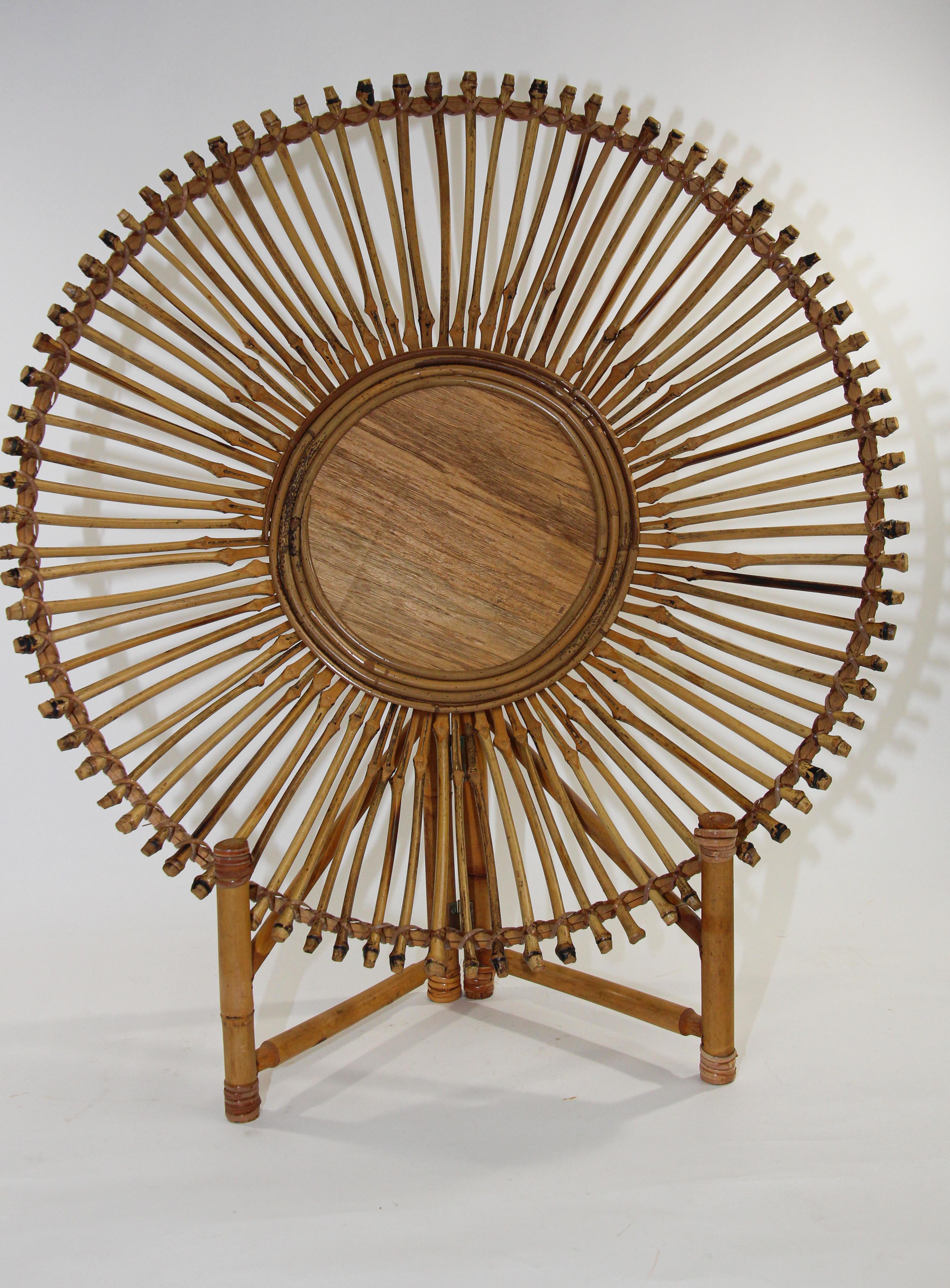 Large Asian rattan handcrafted decorative bowl on bamboo stand.
Large vintage tribal handwoven bamboo ethnic round basket.
Deep bowl shape, woven with seagrass technique and decorated with a wooden piece in the middle.
Definitely a statement