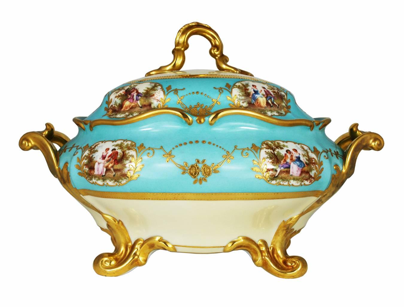 A large beautiful porcelain tureen with a plate in Celeste aqua blue color with gold painted decoration made by Thomas Bavaria. 

The tureen has four romantic courtship scenes on the body and four on the lid, along with gold painted floral swags
